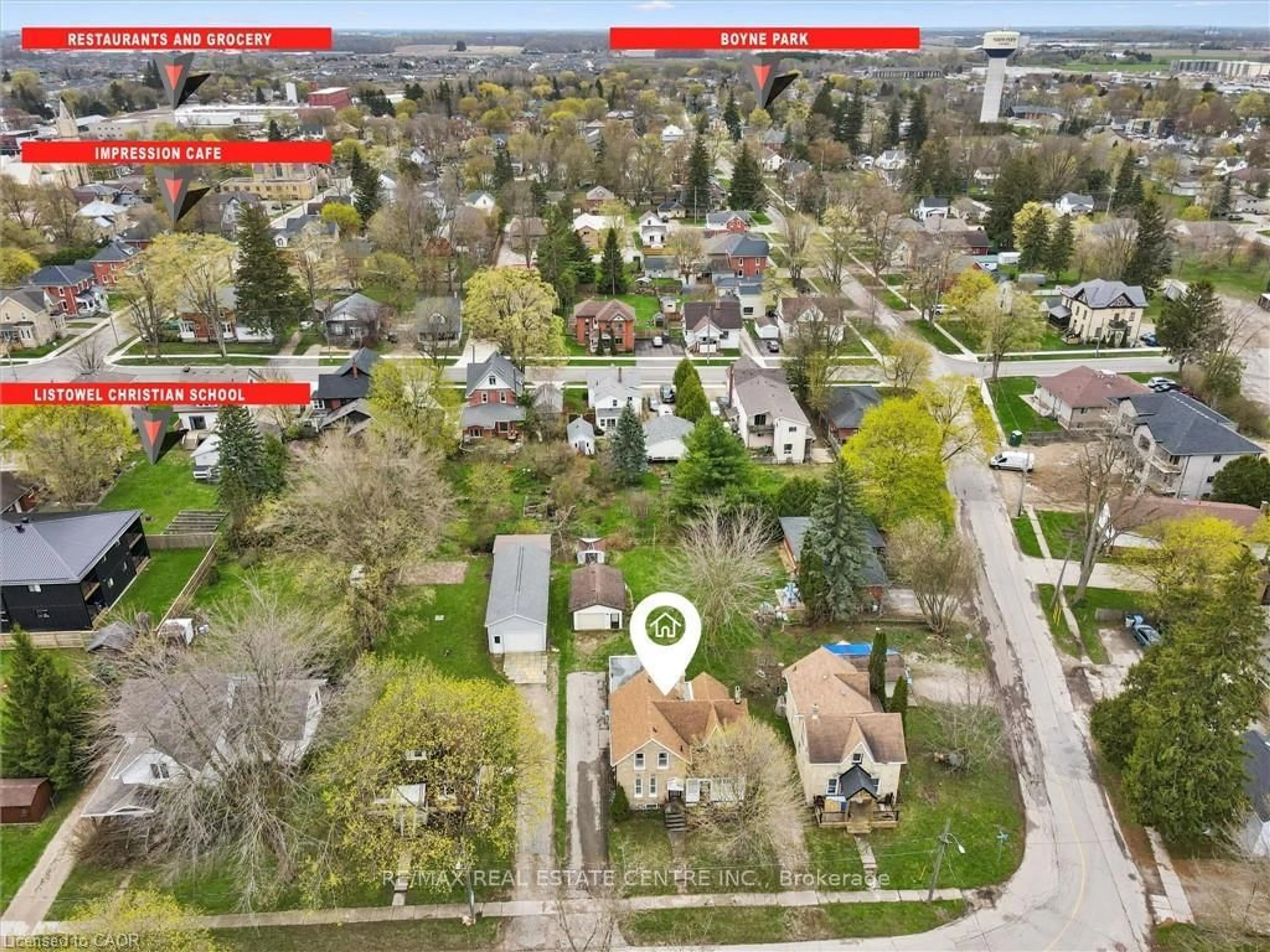 A pic from outside/outdoor area/front of a property/back of a property/a pic from drone, street for 476-478 Campbell St, North Perth Ontario N4W 1J3