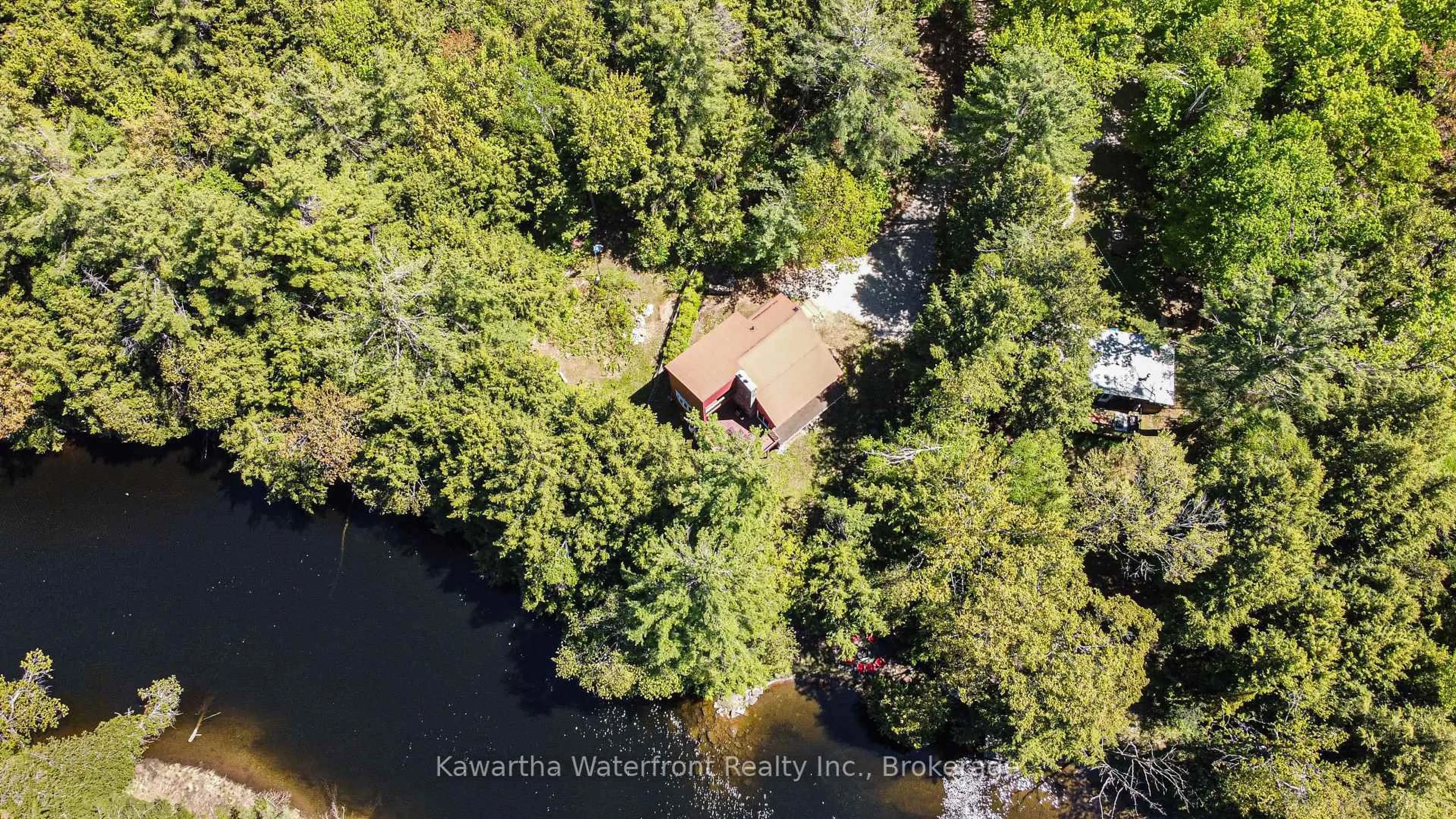 A pic from outside/outdoor area/front of a property/back of a property/a pic from drone, water/lake/river/ocean view for 85 Nevison Dr, Kawartha Lakes Ontario K0M 2L0