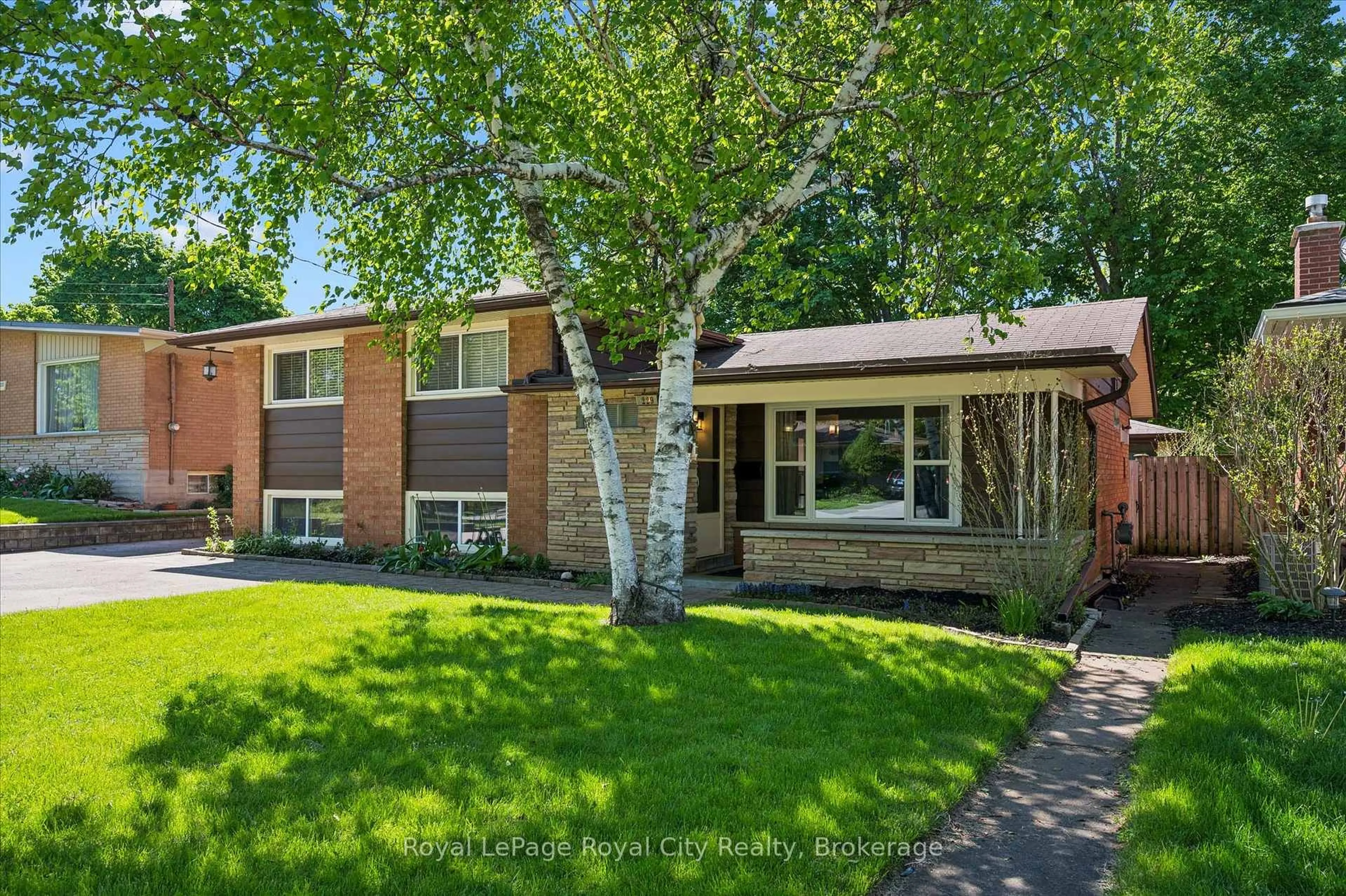 Home with brick exterior material, street for 229 Ross Ave, Kitchener Ontario N2A 1V7