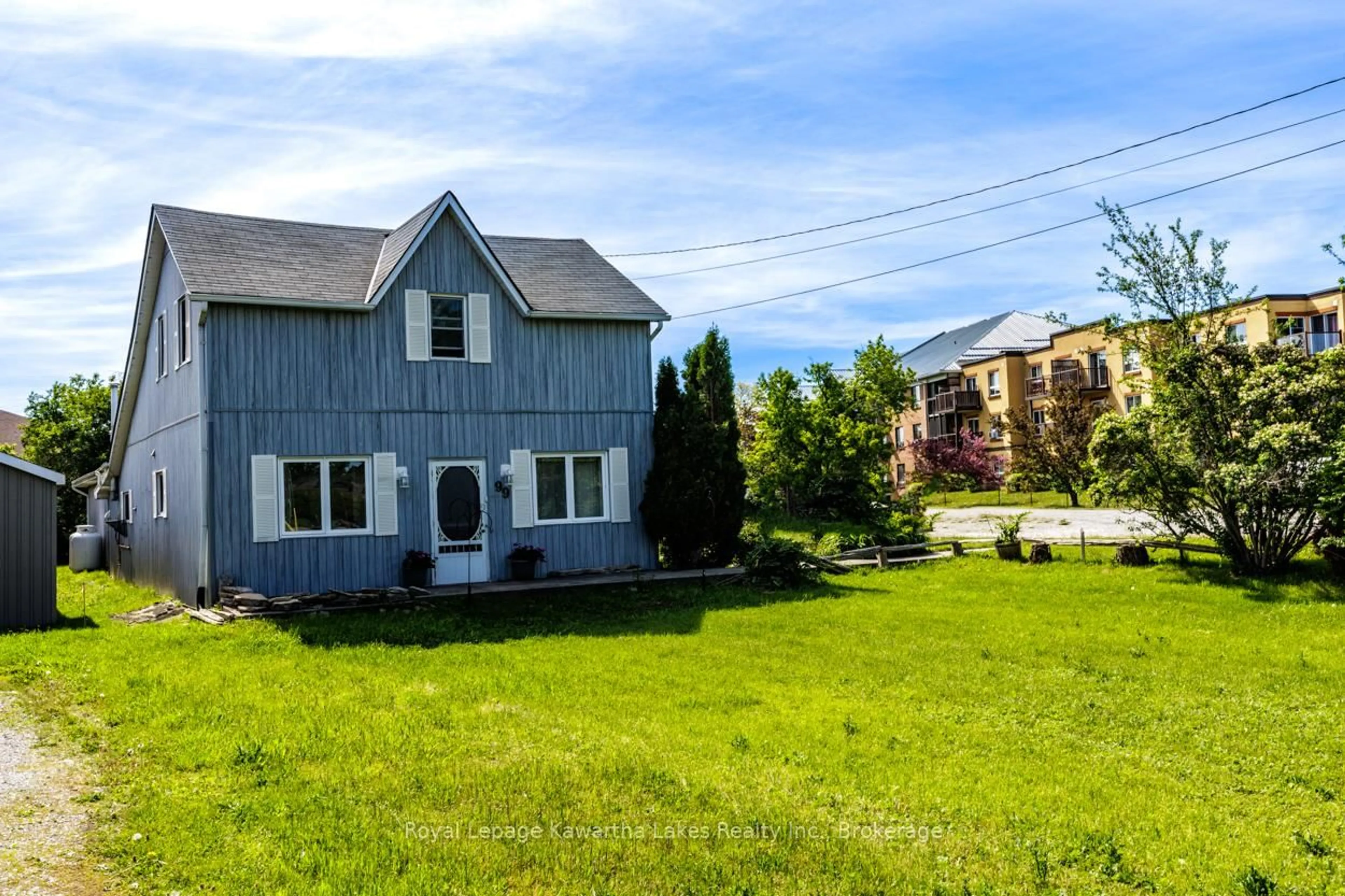 A pic from outside/outdoor area/front of a property/back of a property/a pic from drone, unknown for 99 Lindsay St, Kawartha Lakes Ontario K0M 1N0