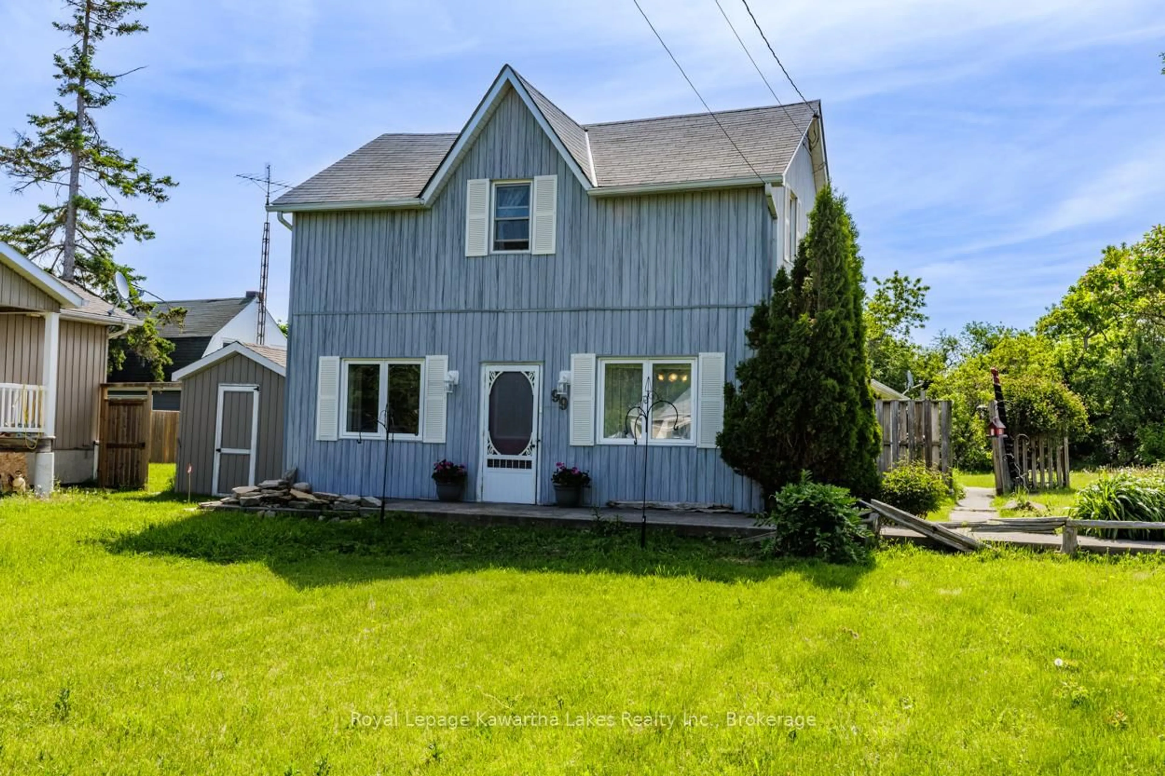 A pic from outside/outdoor area/front of a property/back of a property/a pic from drone, street for 99 Lindsay St, Kawartha Lakes Ontario K0M 1N0