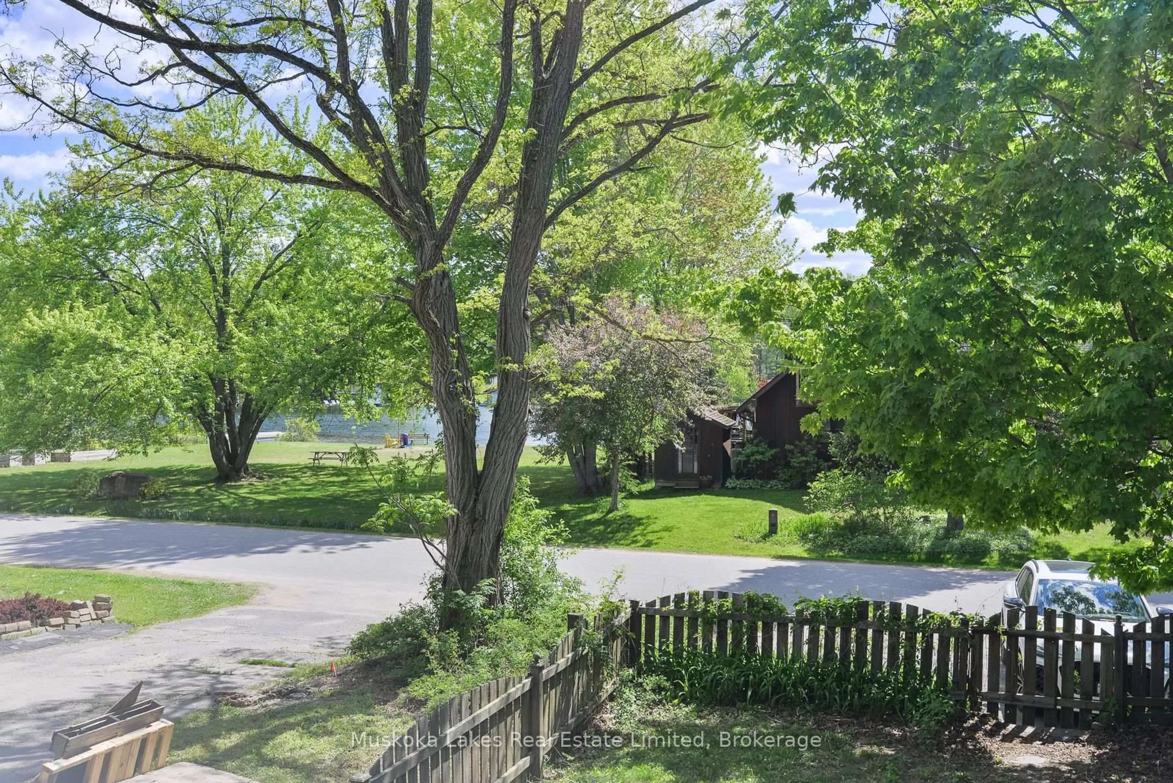 A pic from outside/outdoor area/front of a property/back of a property/a pic from drone, street for 11 Harris St, Muskoka Lakes Ontario P0B 1J0