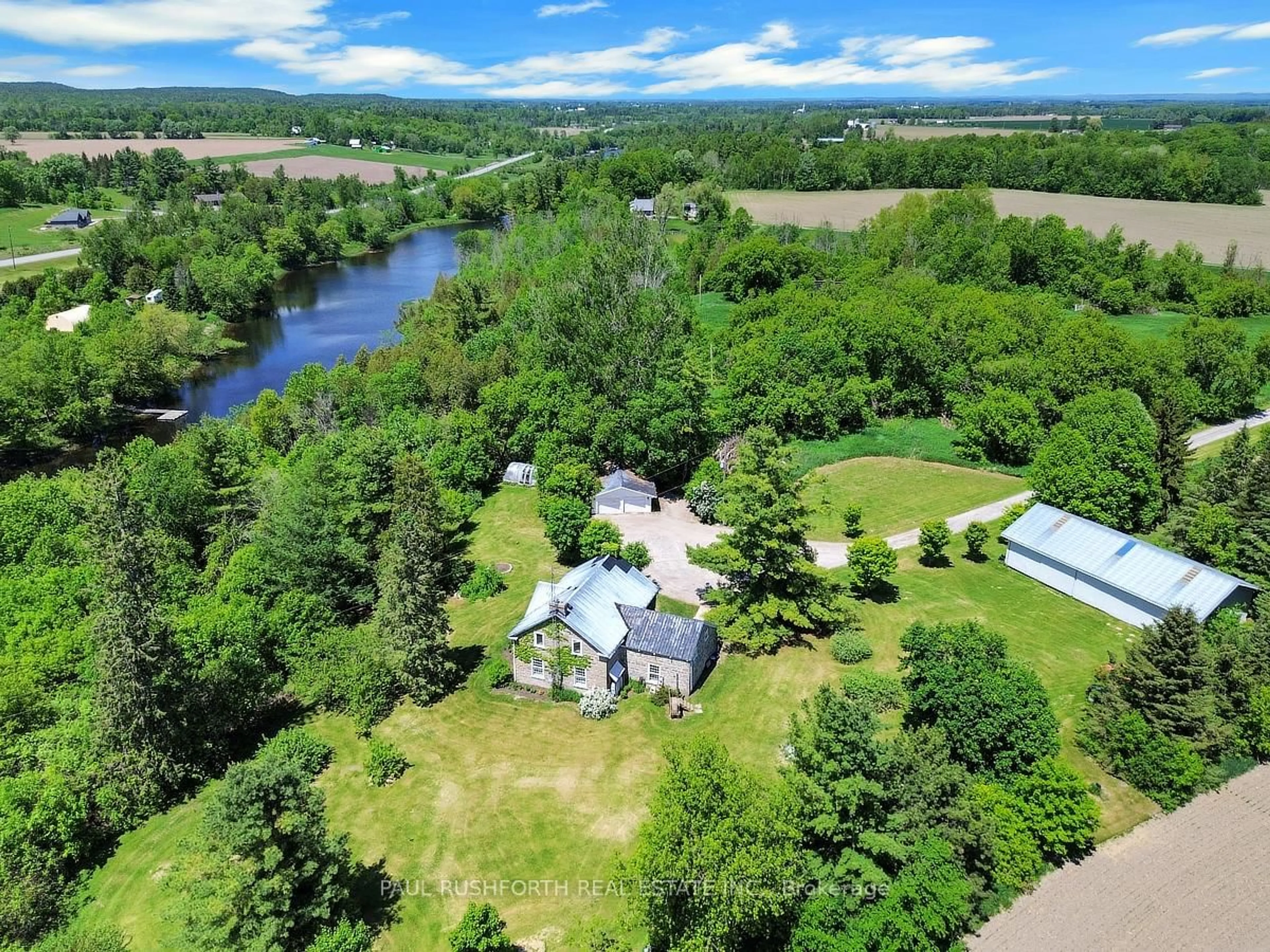 A pic from outside/outdoor area/front of a property/back of a property/a pic from drone, water/lake/river/ocean view for 1453 Blakeney Rd, Pakenham Ontario K0A 2X0