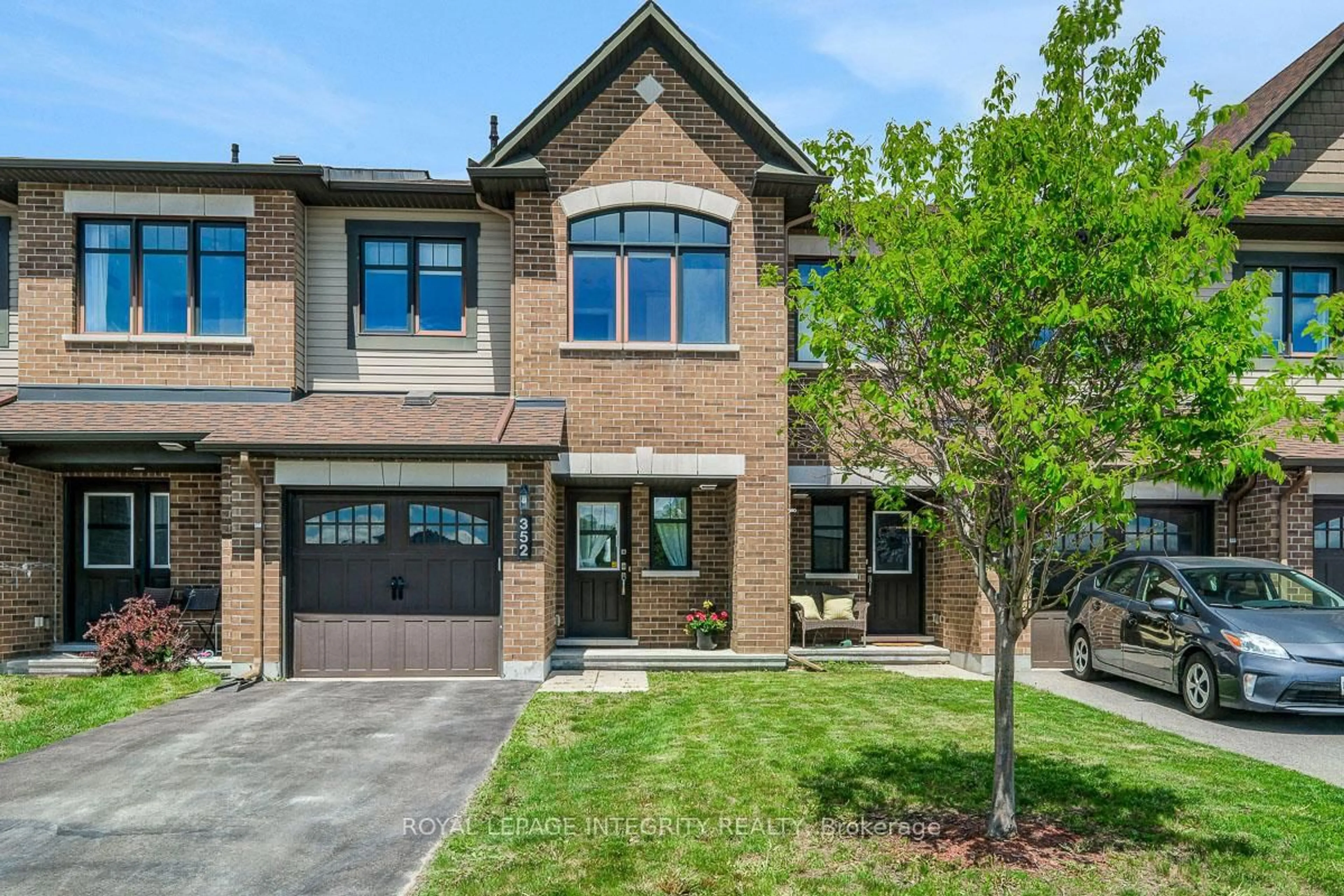 Home with brick exterior material, street for 352 Axis Way, Ottawa Ontario K1W 0J9