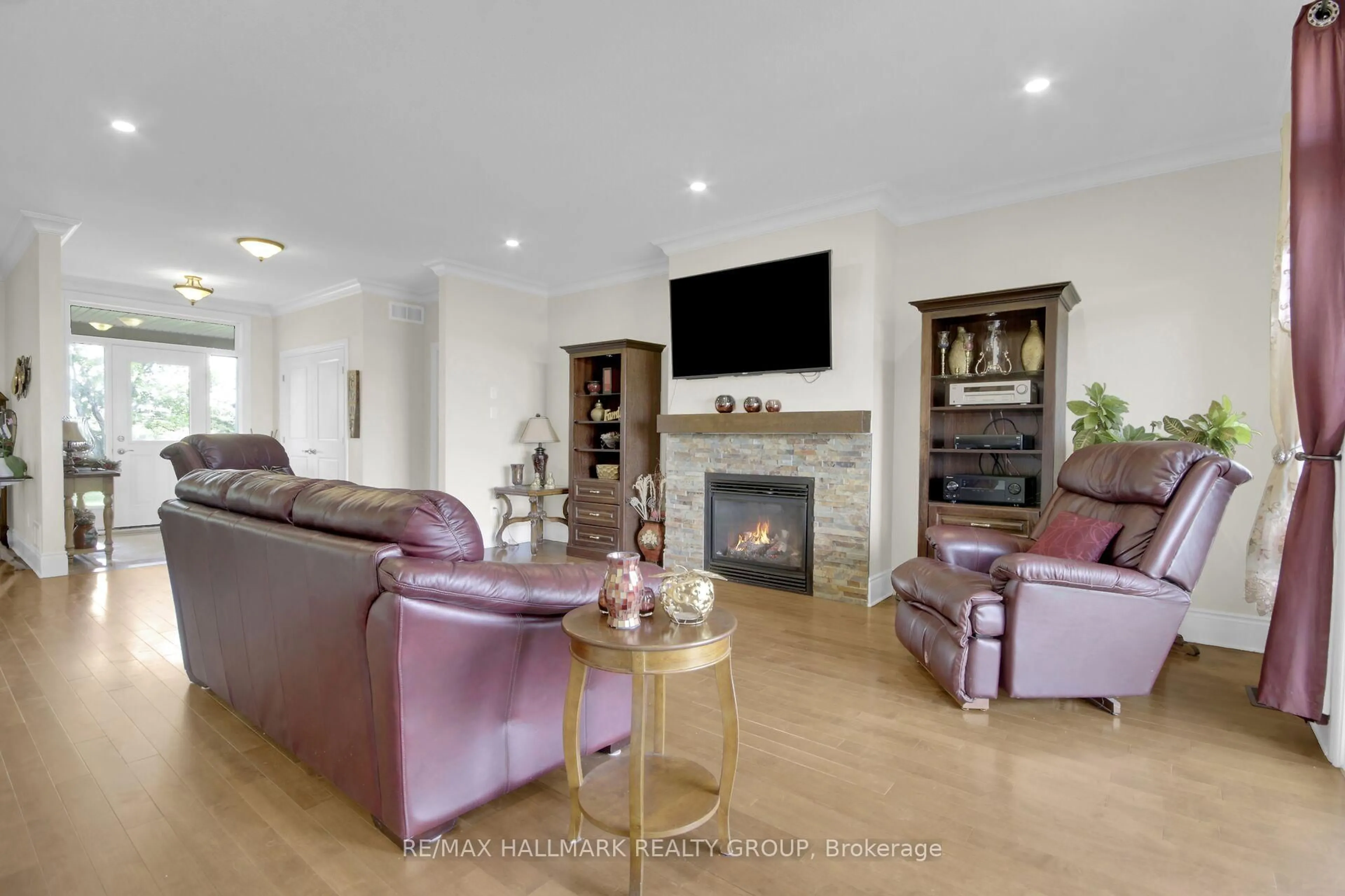 Living room with furniture, wood/laminate floor for 7479 Bleeks Rd, Ashton Ontario K0A 1B0