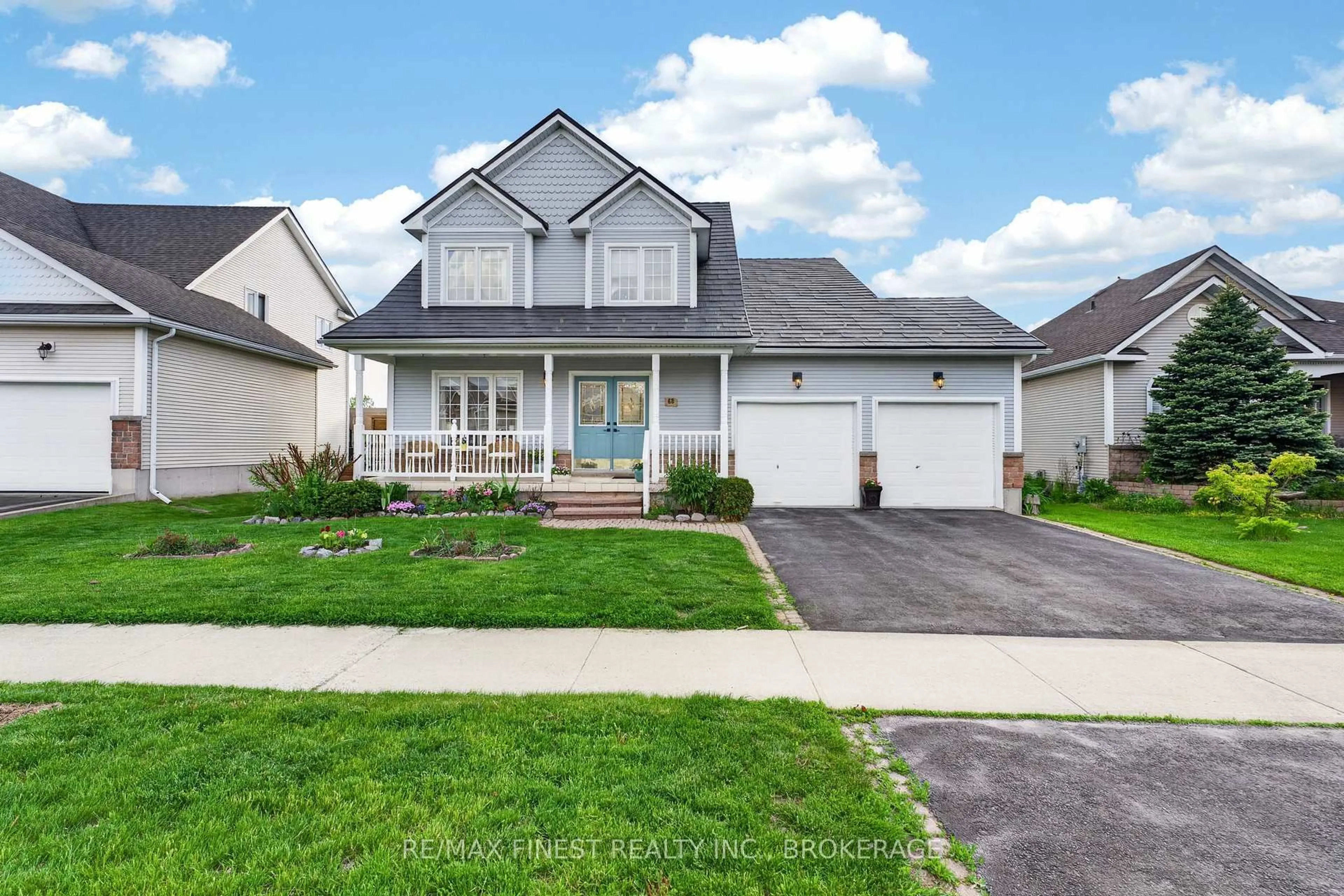 Home with vinyl exterior material, street for 68 Country Club Dr, Bath Ontario K0H 1G0