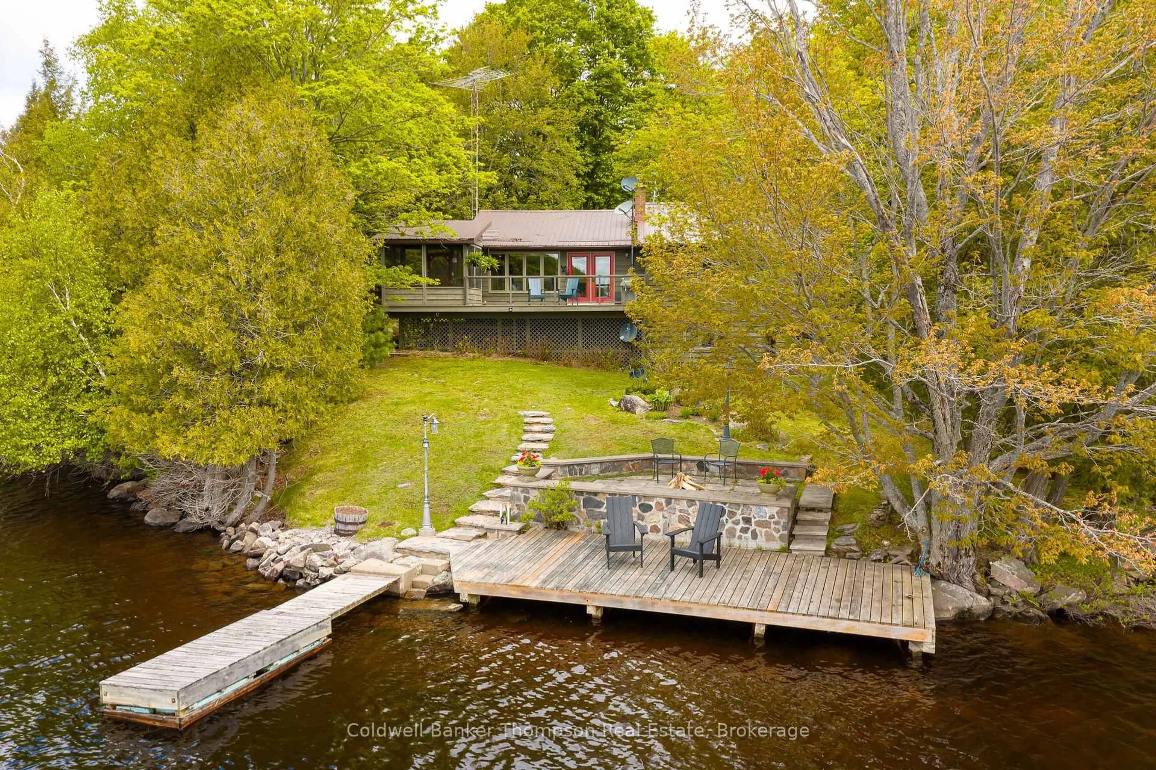 A pic from outside/outdoor area/front of a property/back of a property/a pic from drone, water/lake/river/ocean view for 286 Holden Rd, Magnetawan Ontario P0A 1C0