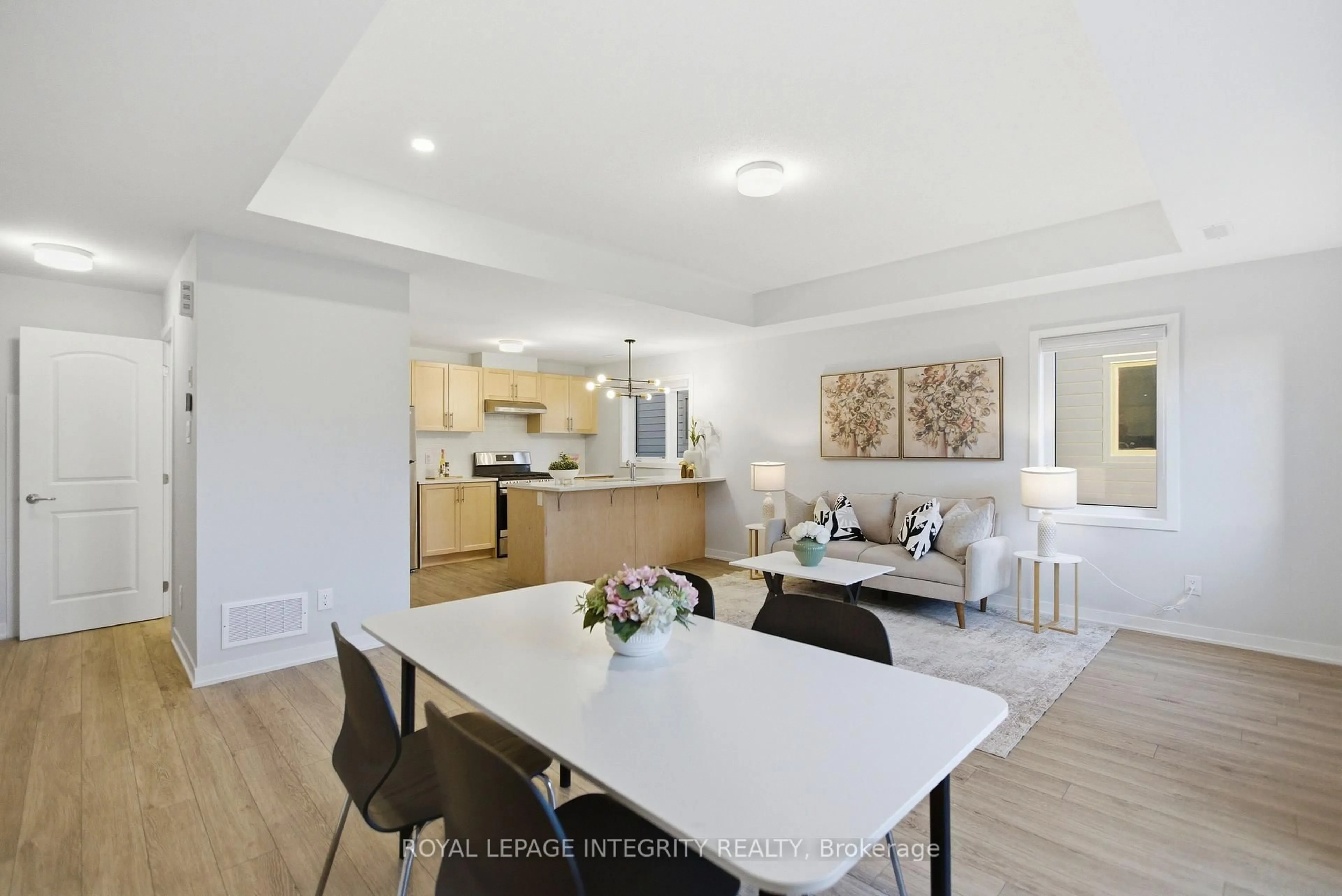 Open concept kitchen, wood/laminate floor for 302 Parnian Private, Barrhaven Ontario K2J 7K5