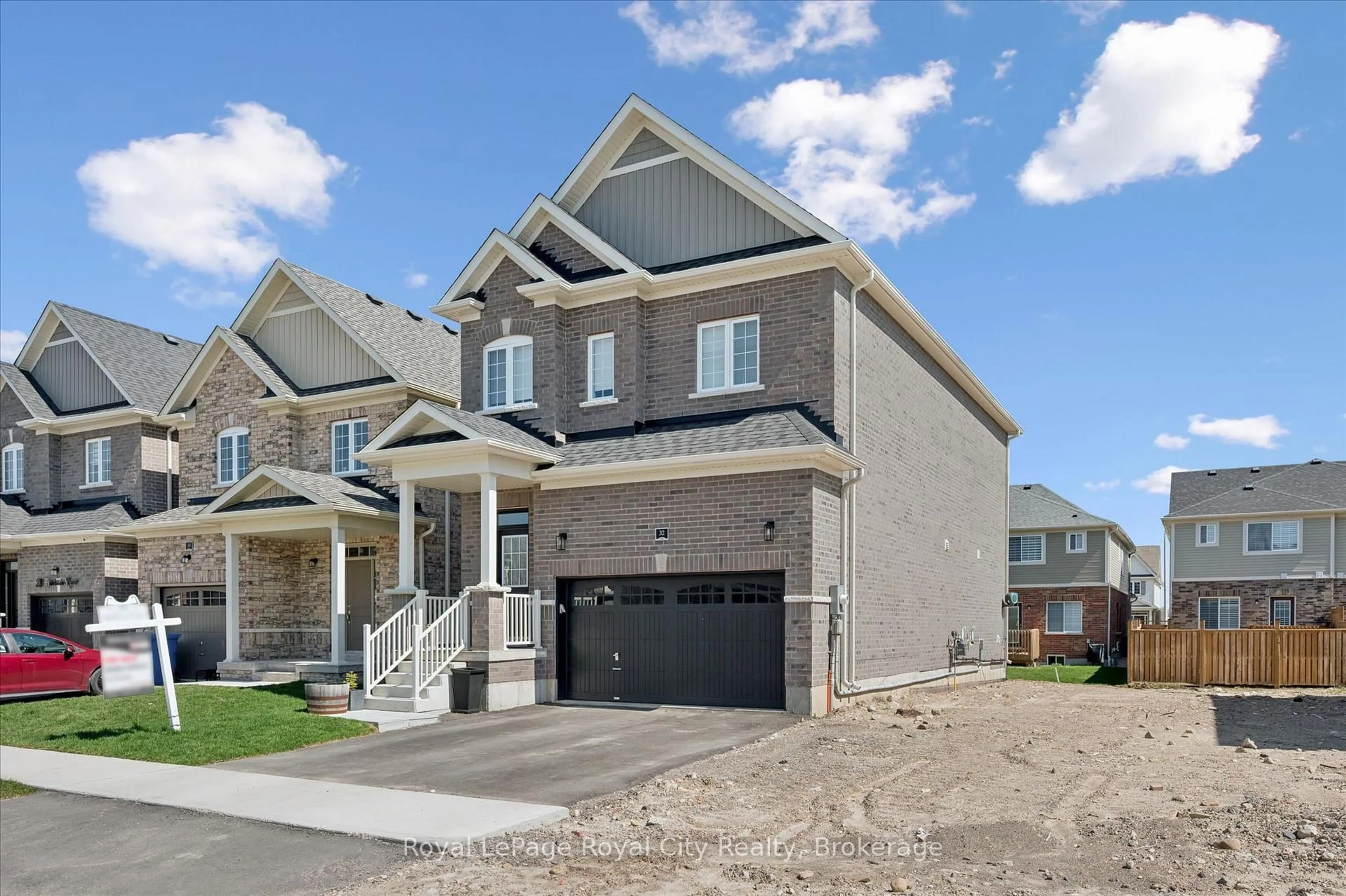 Home with brick exterior material, street for 32 Hutchison Rd, Guelph Ontario N1L 0R4