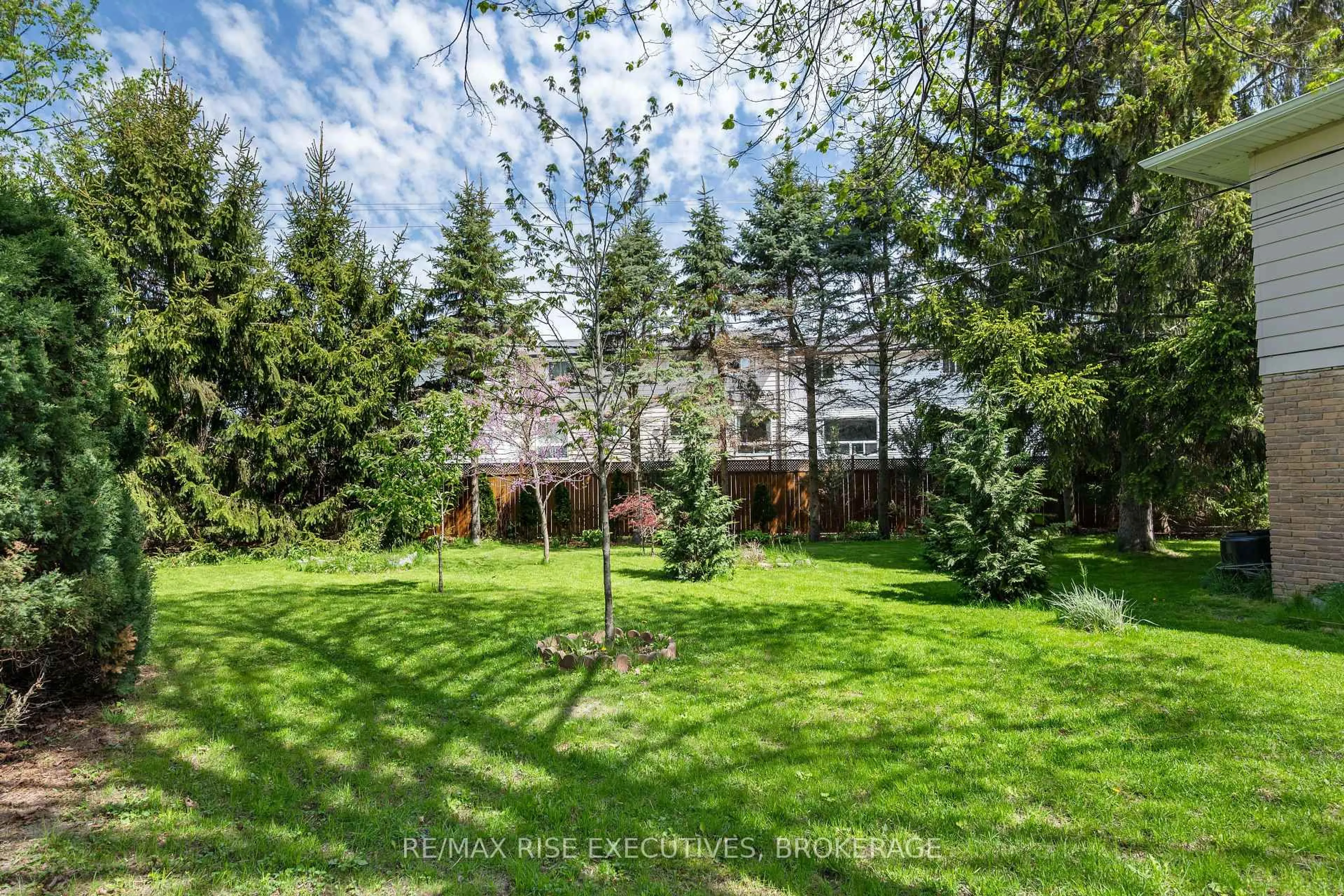 A pic from outside/outdoor area/front of a property/back of a property/a pic from drone, forest/trees view for 707 Laidlaw Cres, Kingston Ontario K7M 5M3