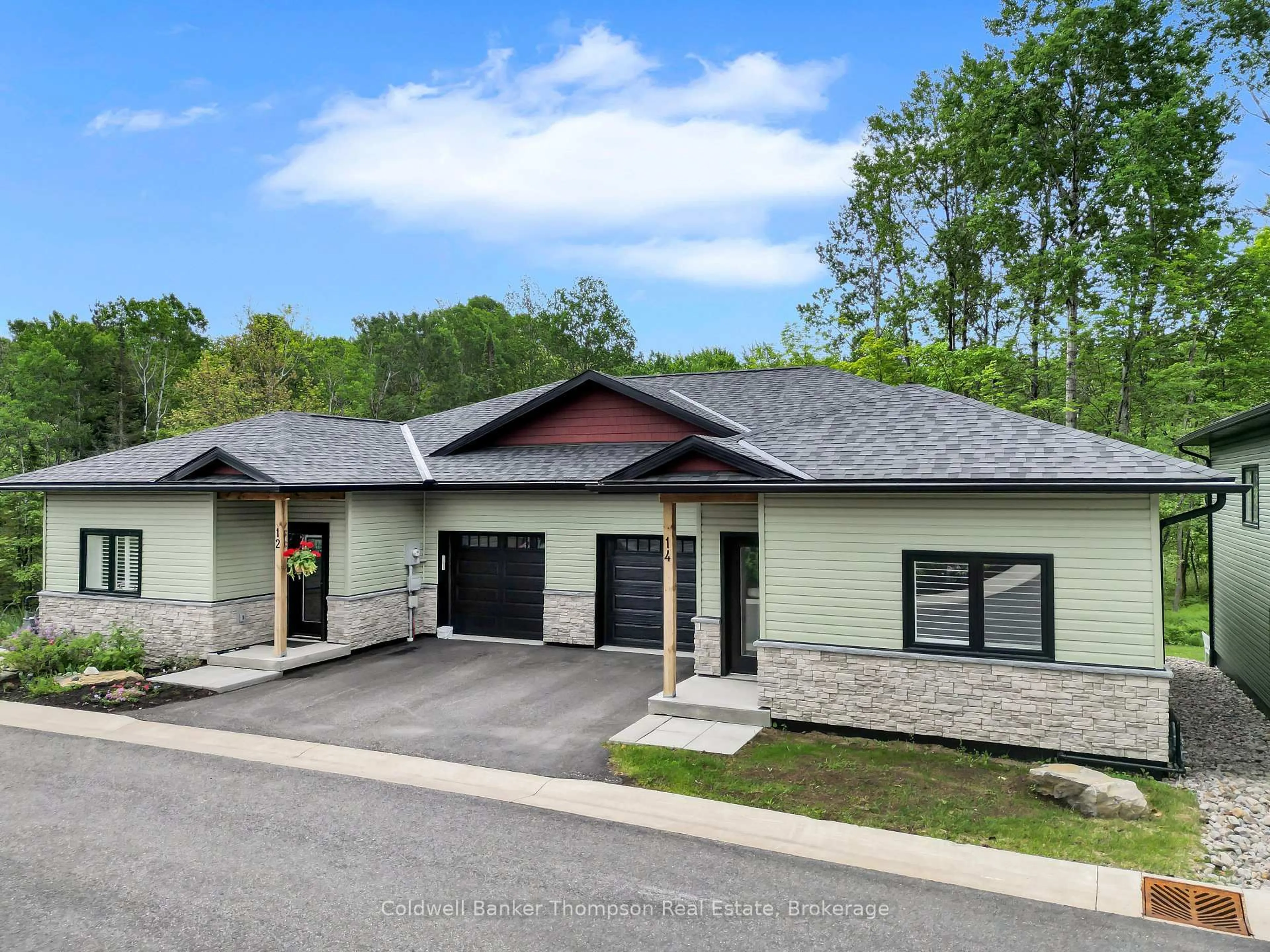 Home with vinyl exterior material, street for 14 Ertler Lane, Huntsville Ontario P1H 1S7