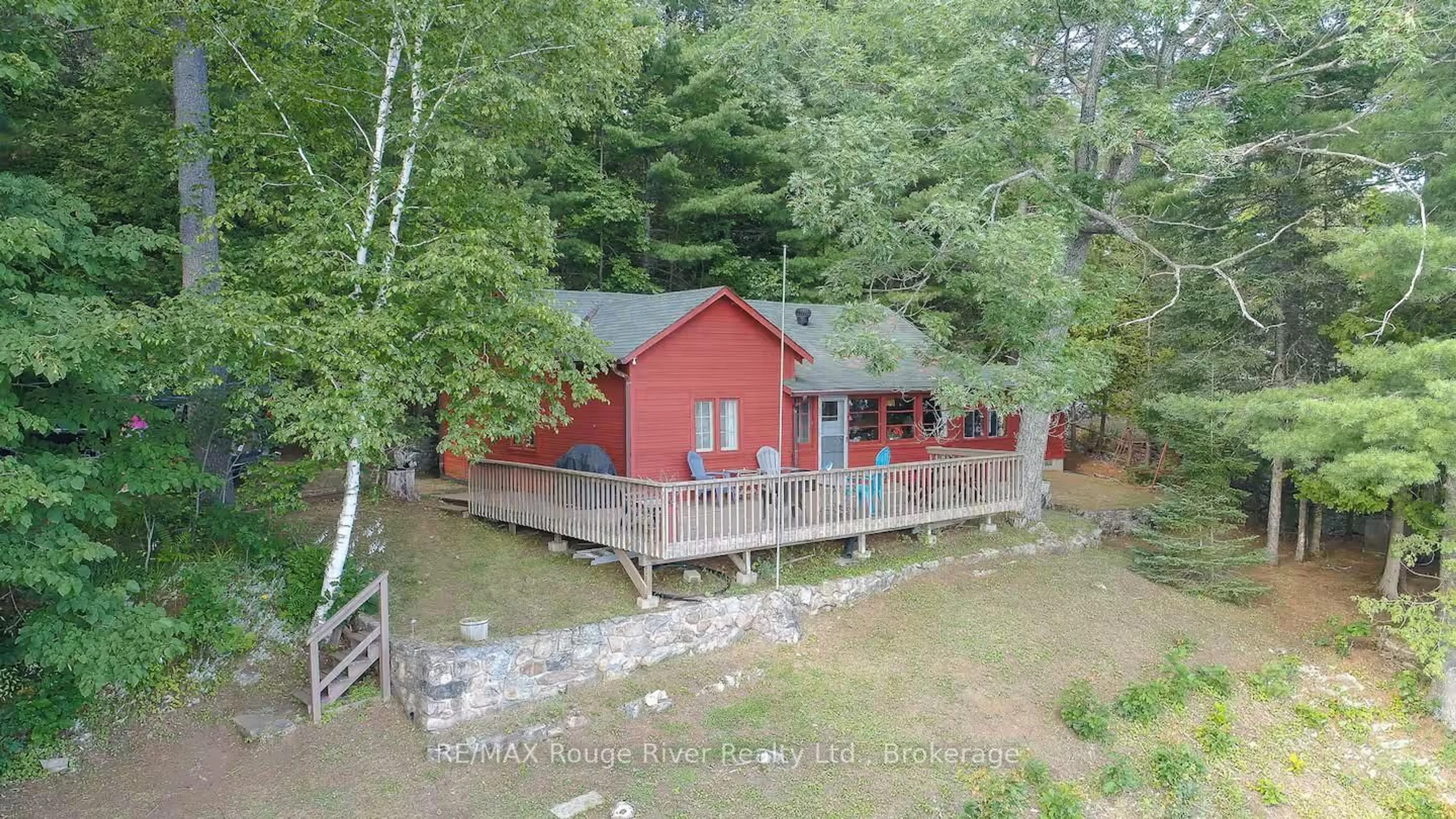 A pic from outside/outdoor area/front of a property/back of a property/a pic from drone, water/lake/river/ocean view for 1246 Sugar Bush Lane, Minden Hills Ontario K0M 2K0
