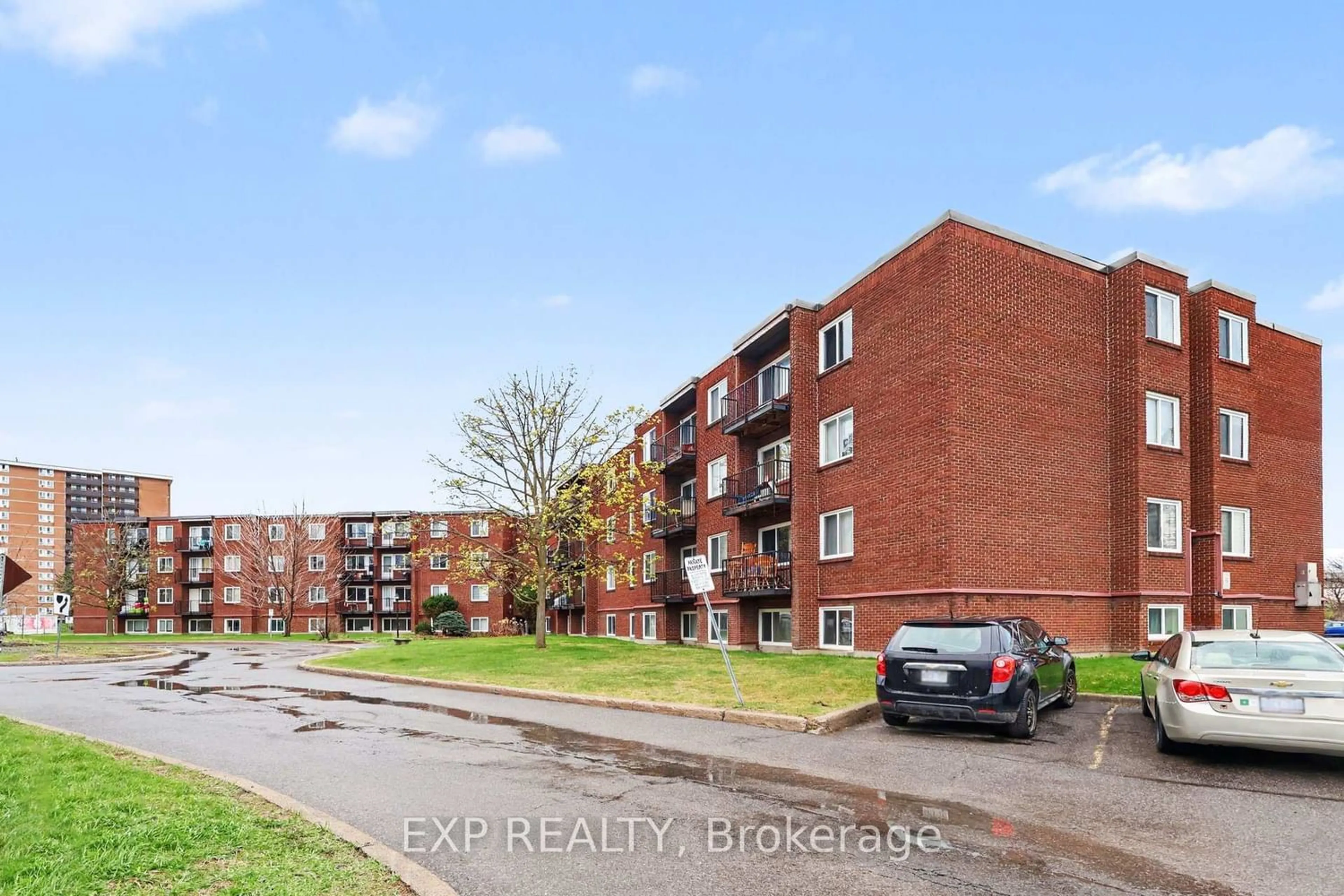 A pic from outside/outdoor area/front of a property/back of a property/a pic from drone, street for 2044 Arrowsmith Dr #405A, Ottawa Ontario K1J 7V8