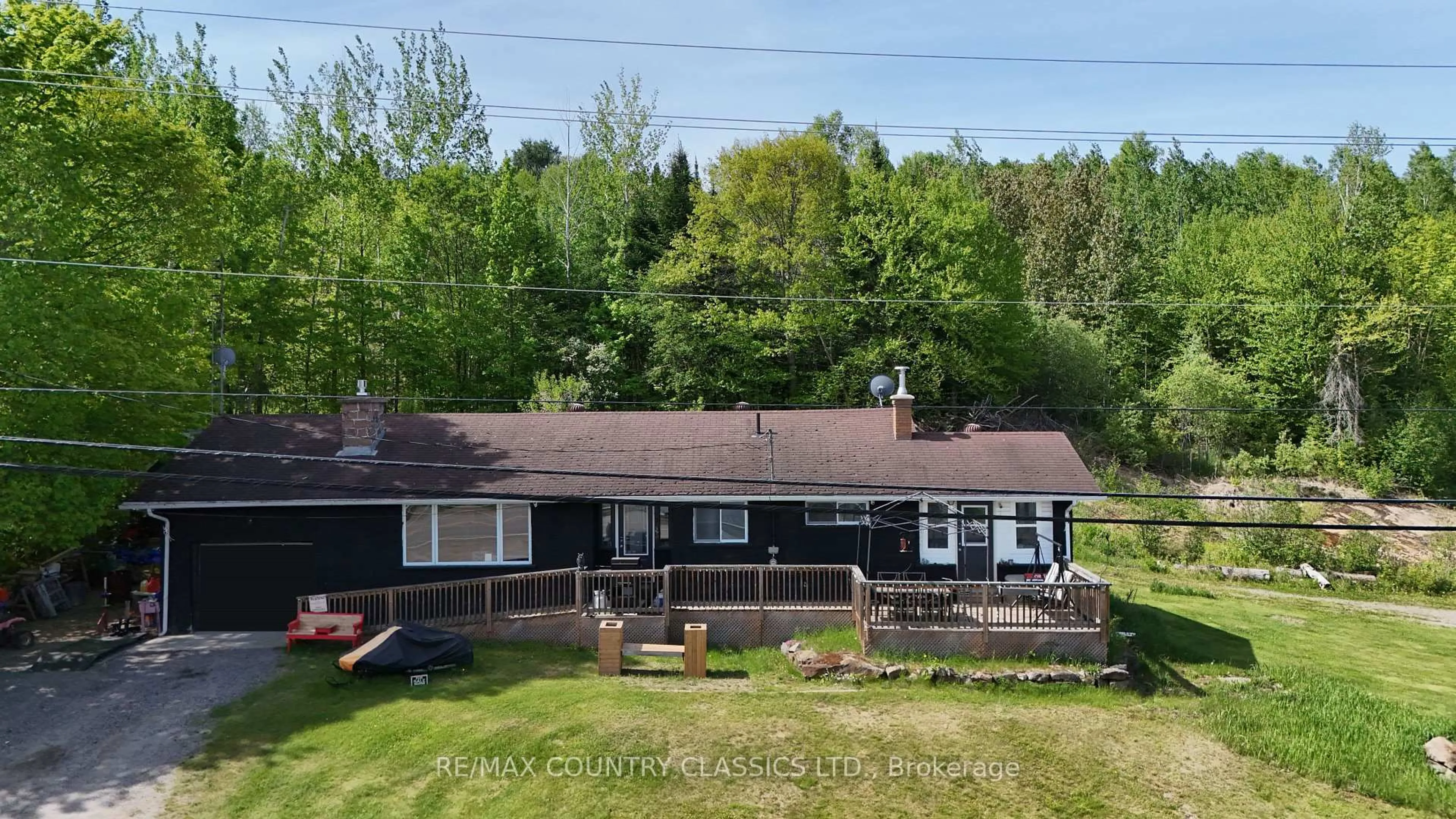 A pic from outside/outdoor area/front of a property/back of a property/a pic from drone, water/lake/river/ocean view for 39132 Combermere Rd, Combermere Ontario K0J 1L0