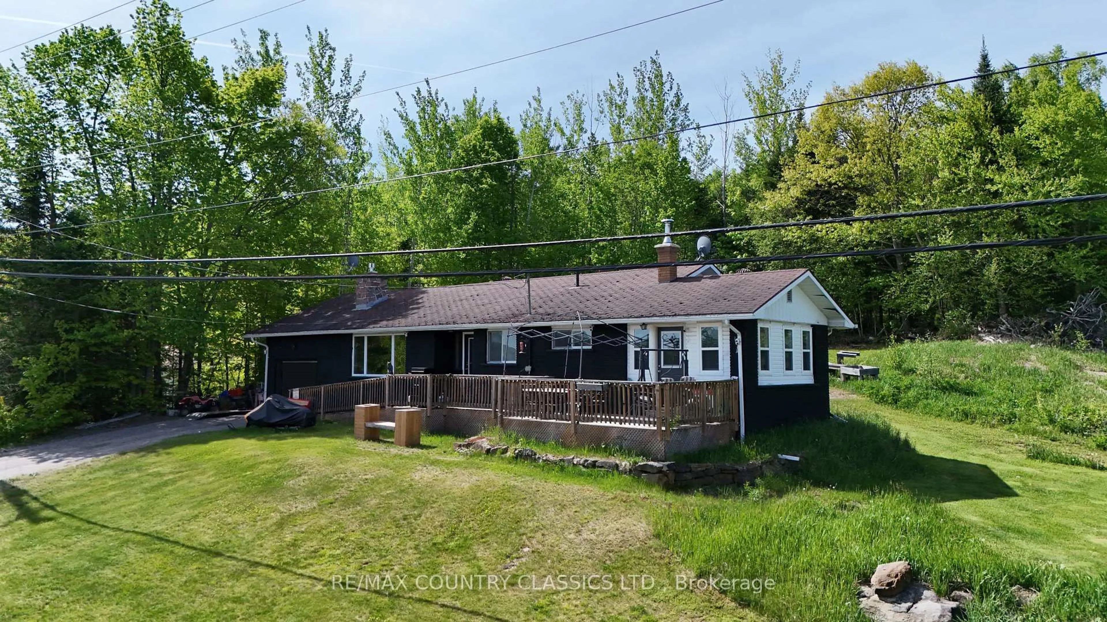 A pic from outside/outdoor area/front of a property/back of a property/a pic from drone, unknown for 39132 Combermere Rd, Combermere Ontario K0J 1L0