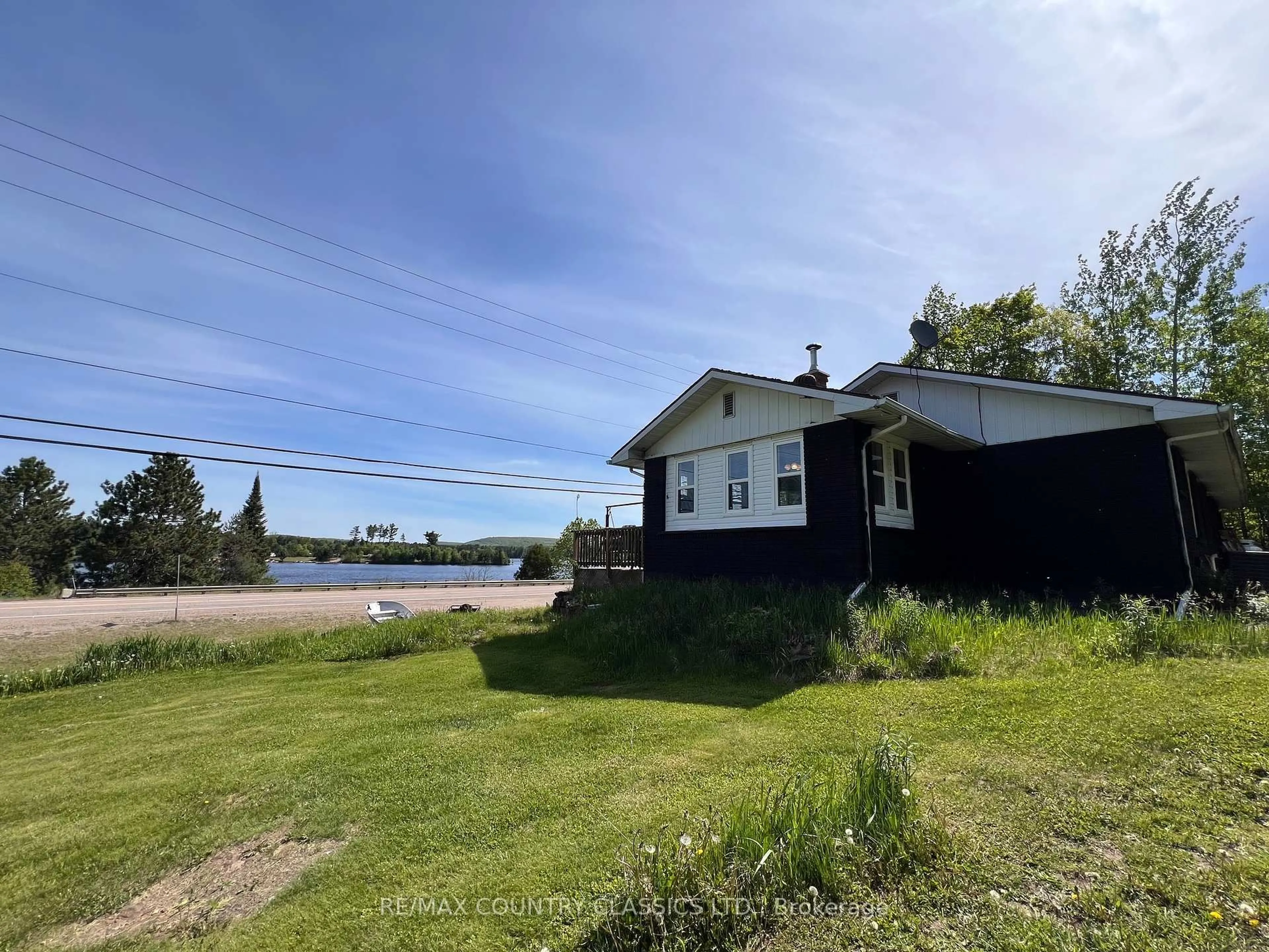 A pic from outside/outdoor area/front of a property/back of a property/a pic from drone, water/lake/river/ocean view for 39132 Combermere Rd, Combermere Ontario K0J 1L0