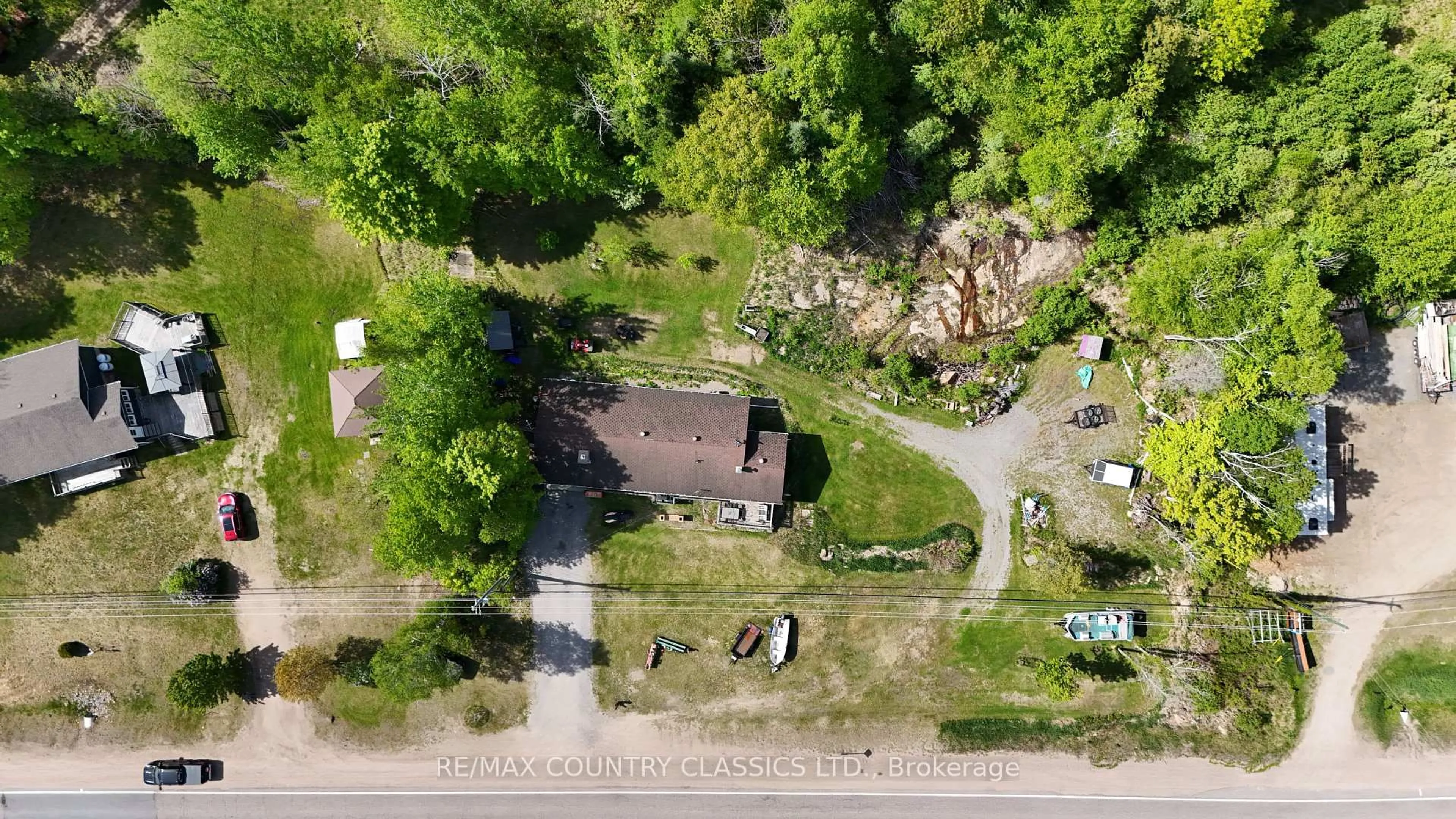 A pic from outside/outdoor area/front of a property/back of a property/a pic from drone, street for 39132 Combermere Rd, Combermere Ontario K0J 1L0