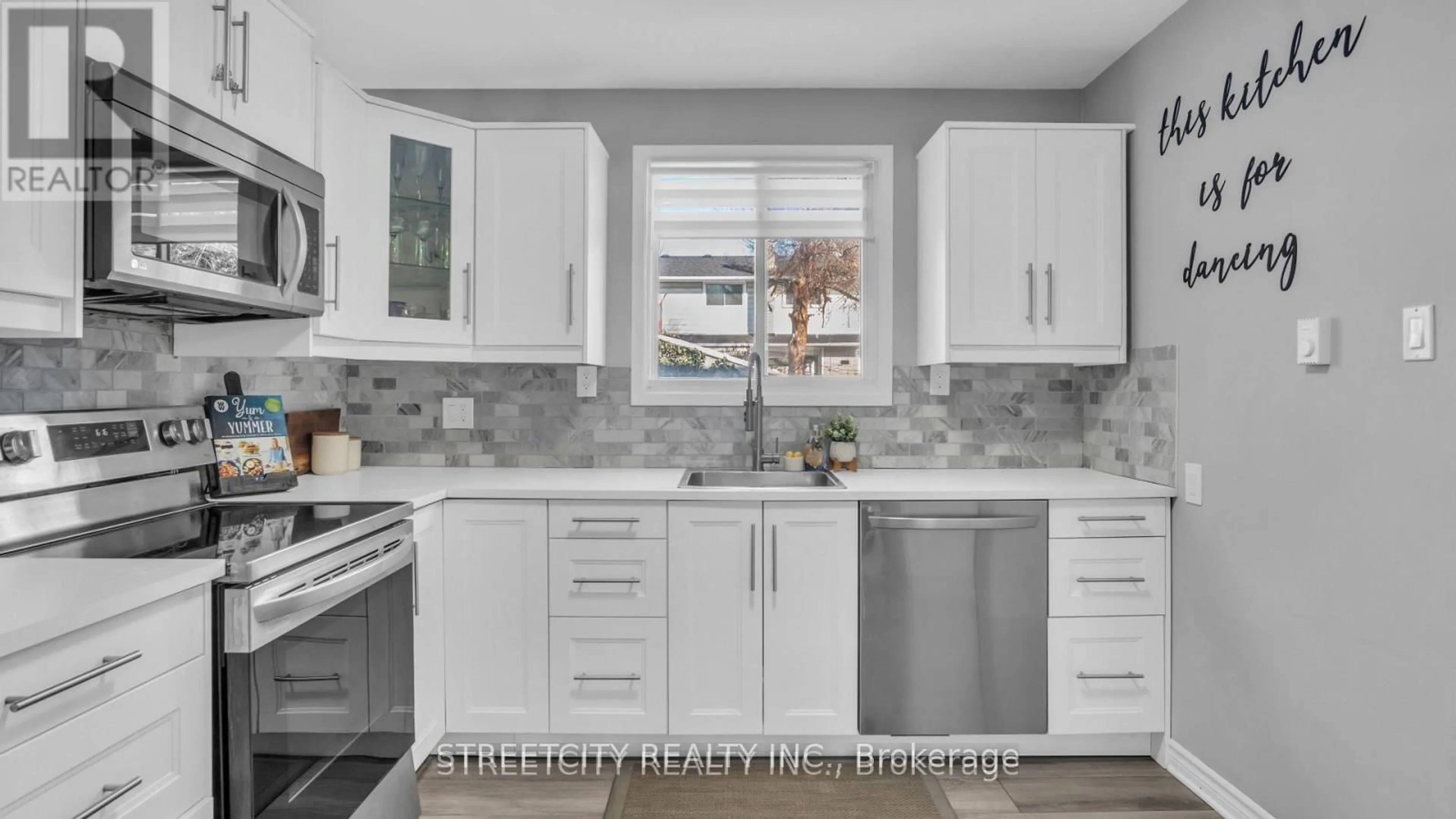 Open concept kitchen, ceramic/tile floor for 490 SOUTHDALE Rd #8, London South Ontario N6E 1A4