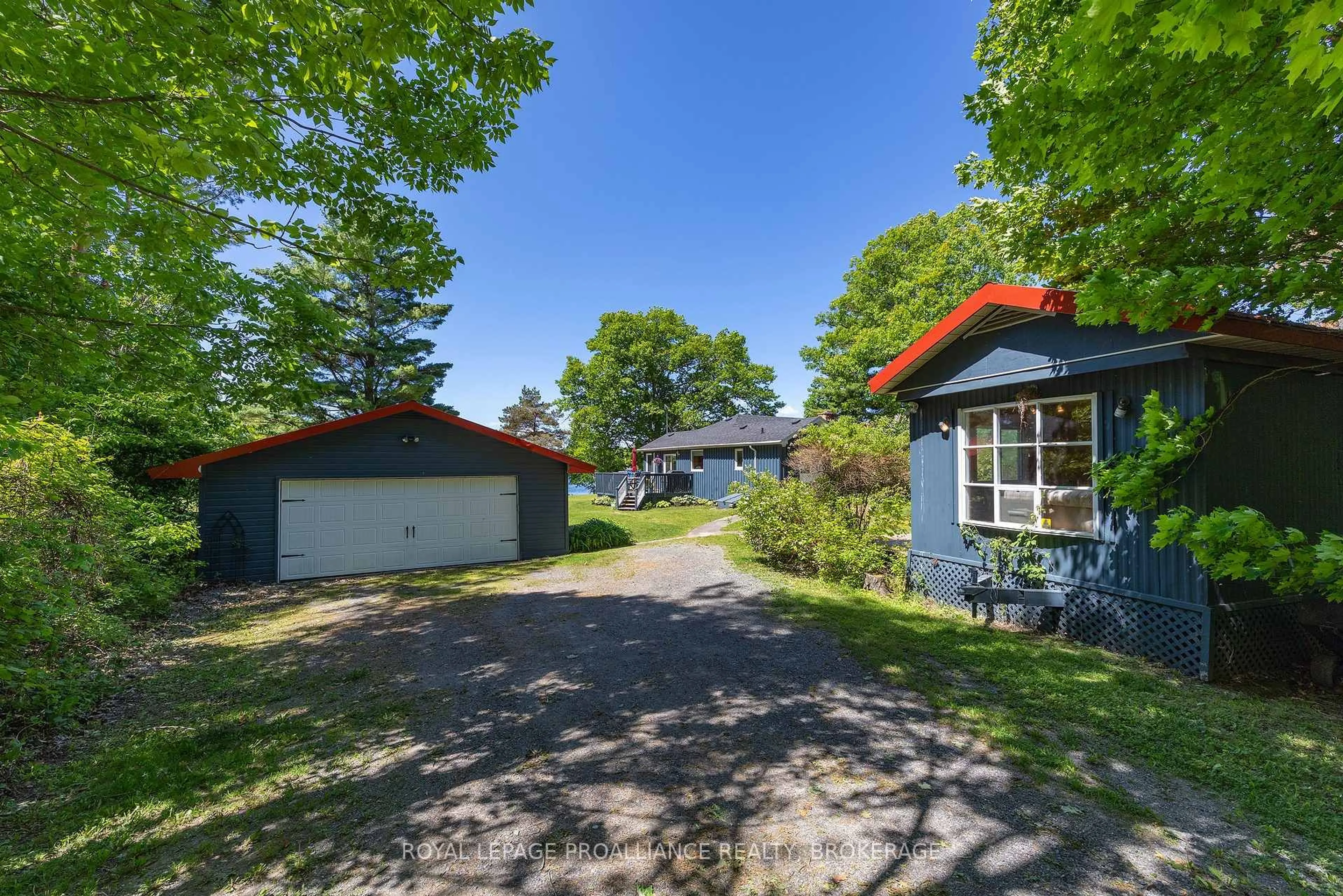 A pic from outside/outdoor area/front of a property/back of a property/a pic from drone, street for 4788 Leo Lake Rd, Seeley's Bay Ontario K0H 2N0