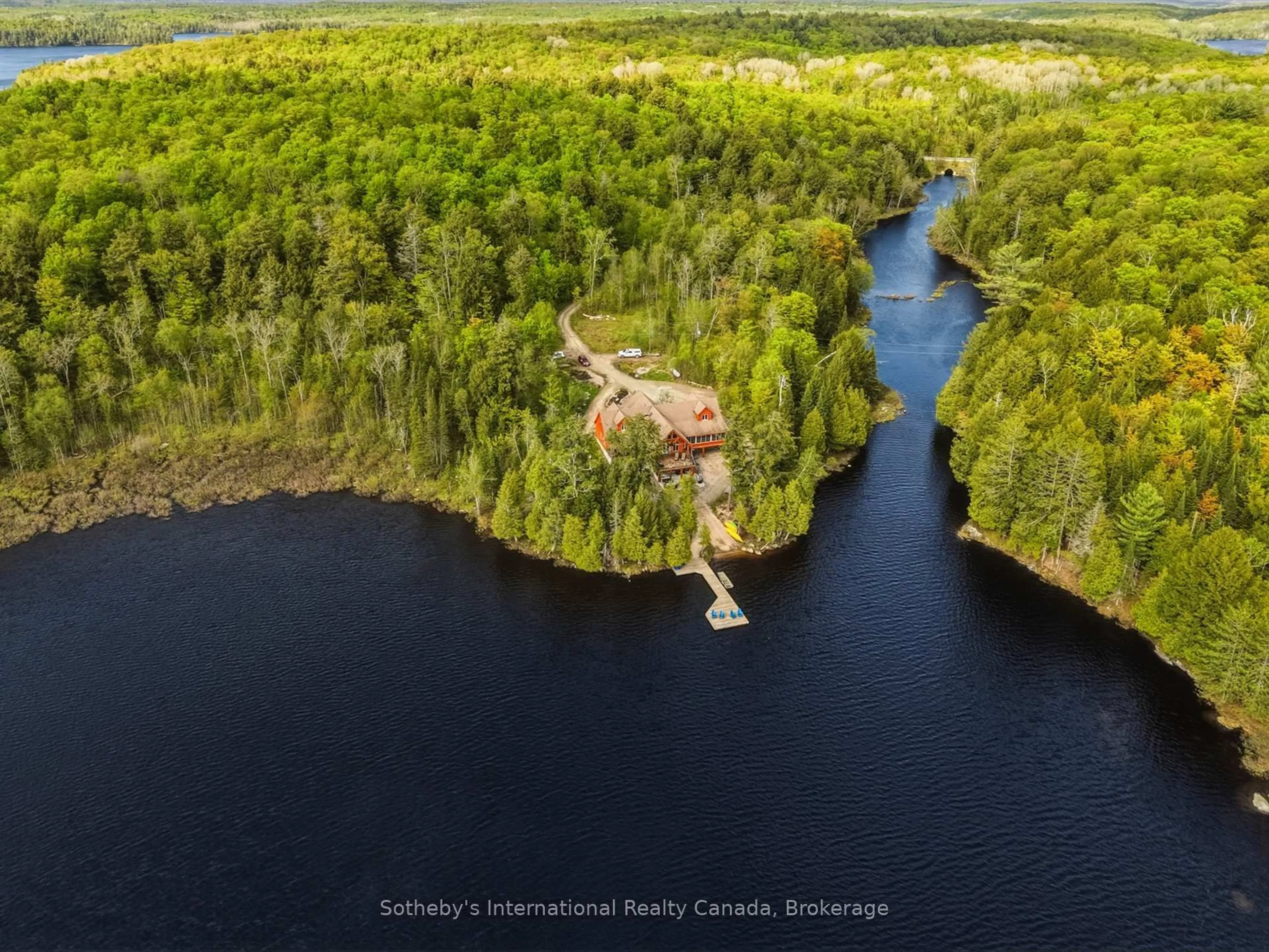A pic from outside/outdoor area/front of a property/back of a property/a pic from drone, water/lake/river/ocean view for 2889 Ahmic Lake Rd, Magnetawan Ontario P0A 1P0