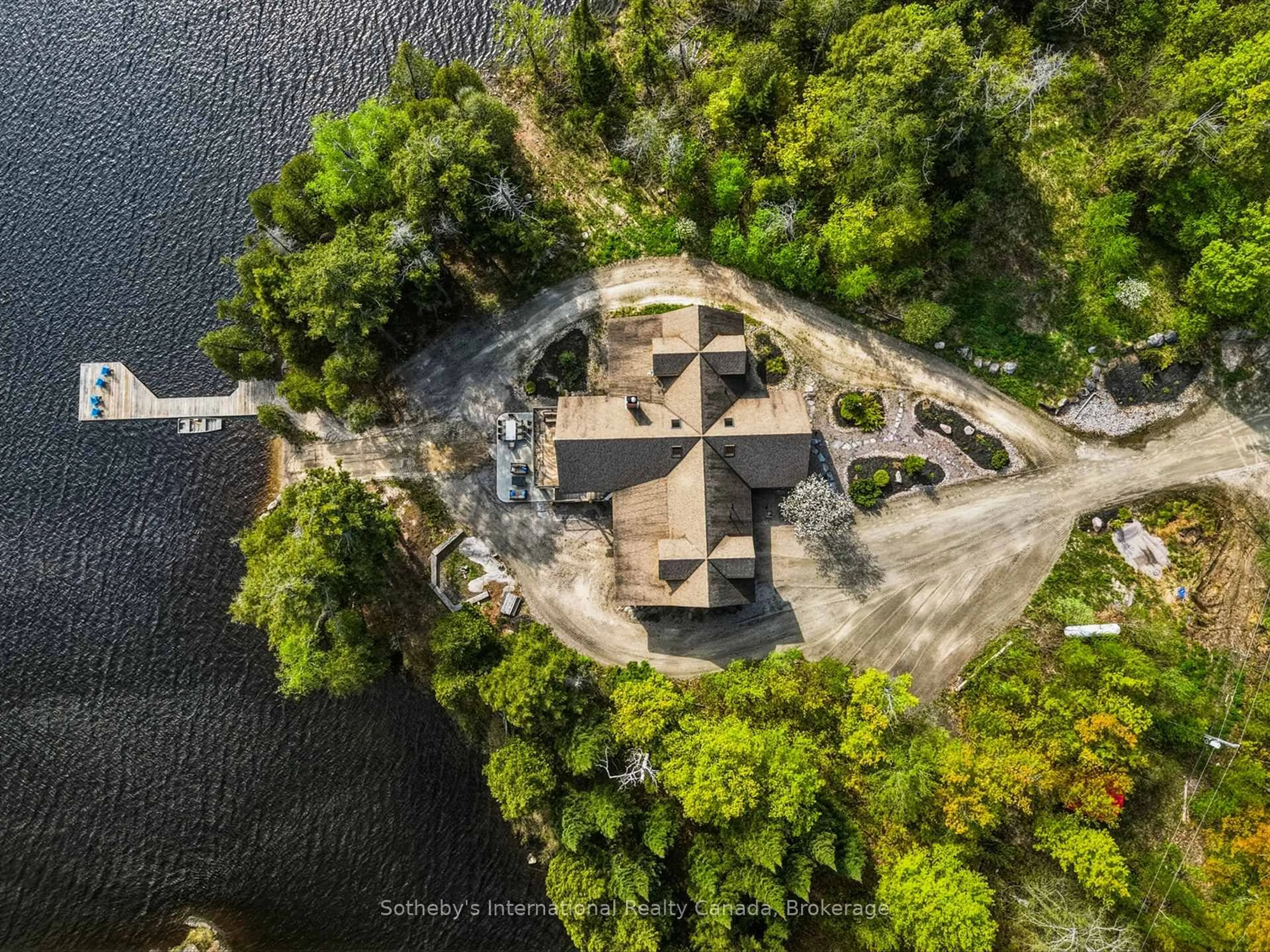 A pic from outside/outdoor area/front of a property/back of a property/a pic from drone, water/lake/river/ocean view for 2889 Ahmic Lake Rd, Magnetawan Ontario P0A 1P0