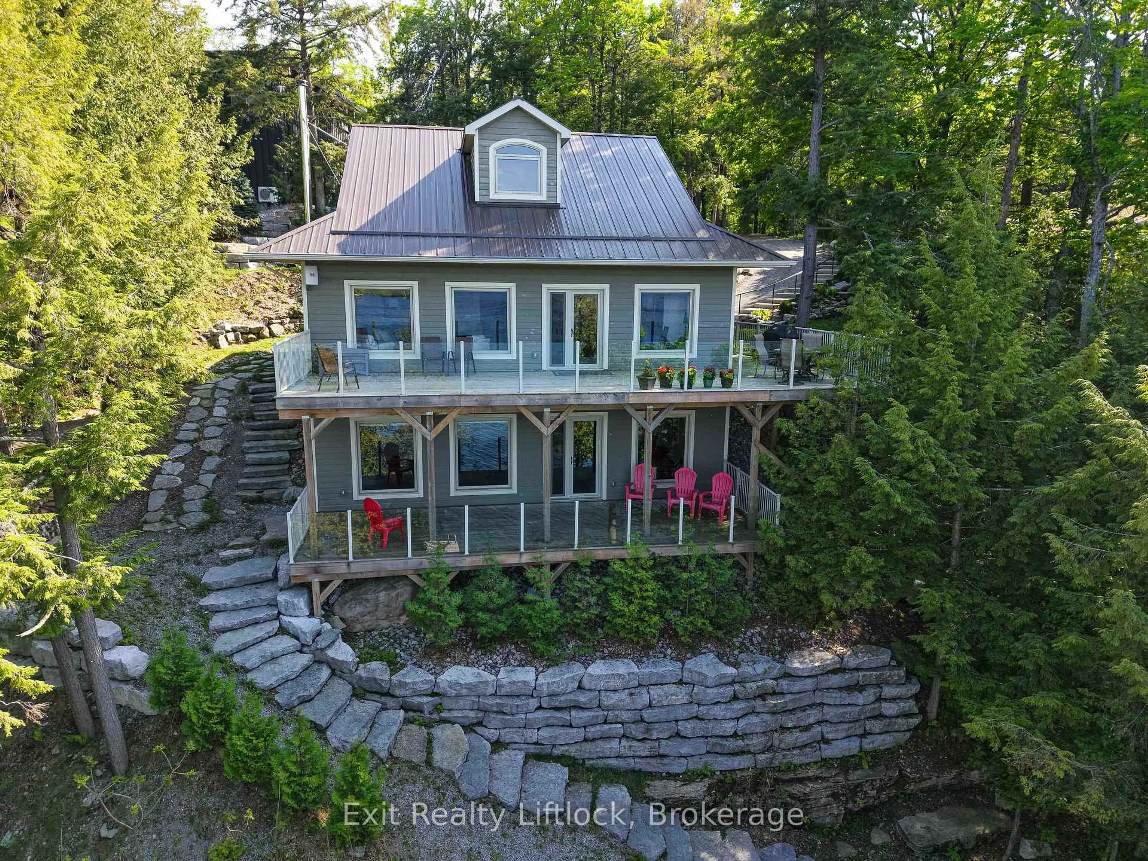 A pic from outside/outdoor area/front of a property/back of a property/a pic from drone, water/lake/river/ocean view for 3051 Fire Route 30, Selwyn Ontario K0L 2H0
