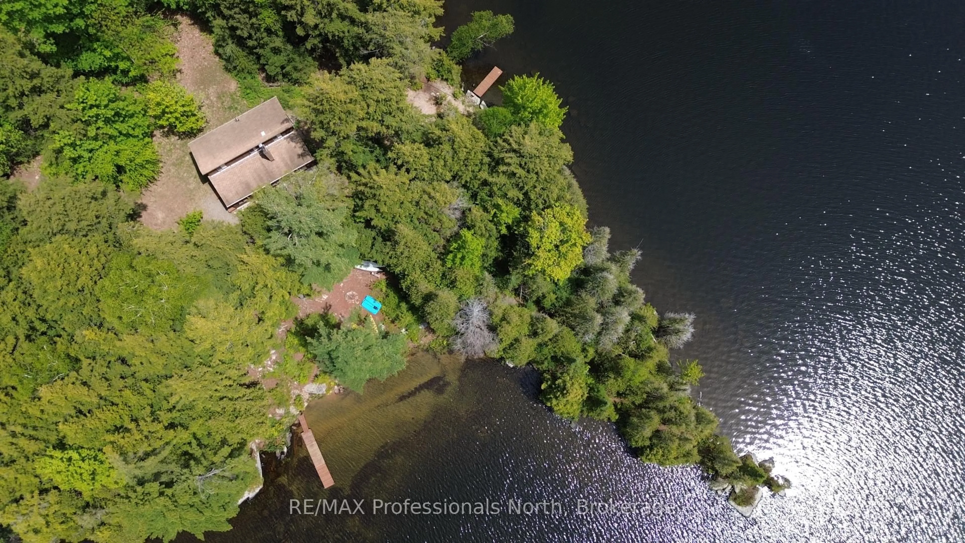 A pic from outside/outdoor area/front of a property/back of a property/a pic from drone, water/lake/river/ocean view for 1294 Trinity Rd, Highlands East Ontario K0L 2A0