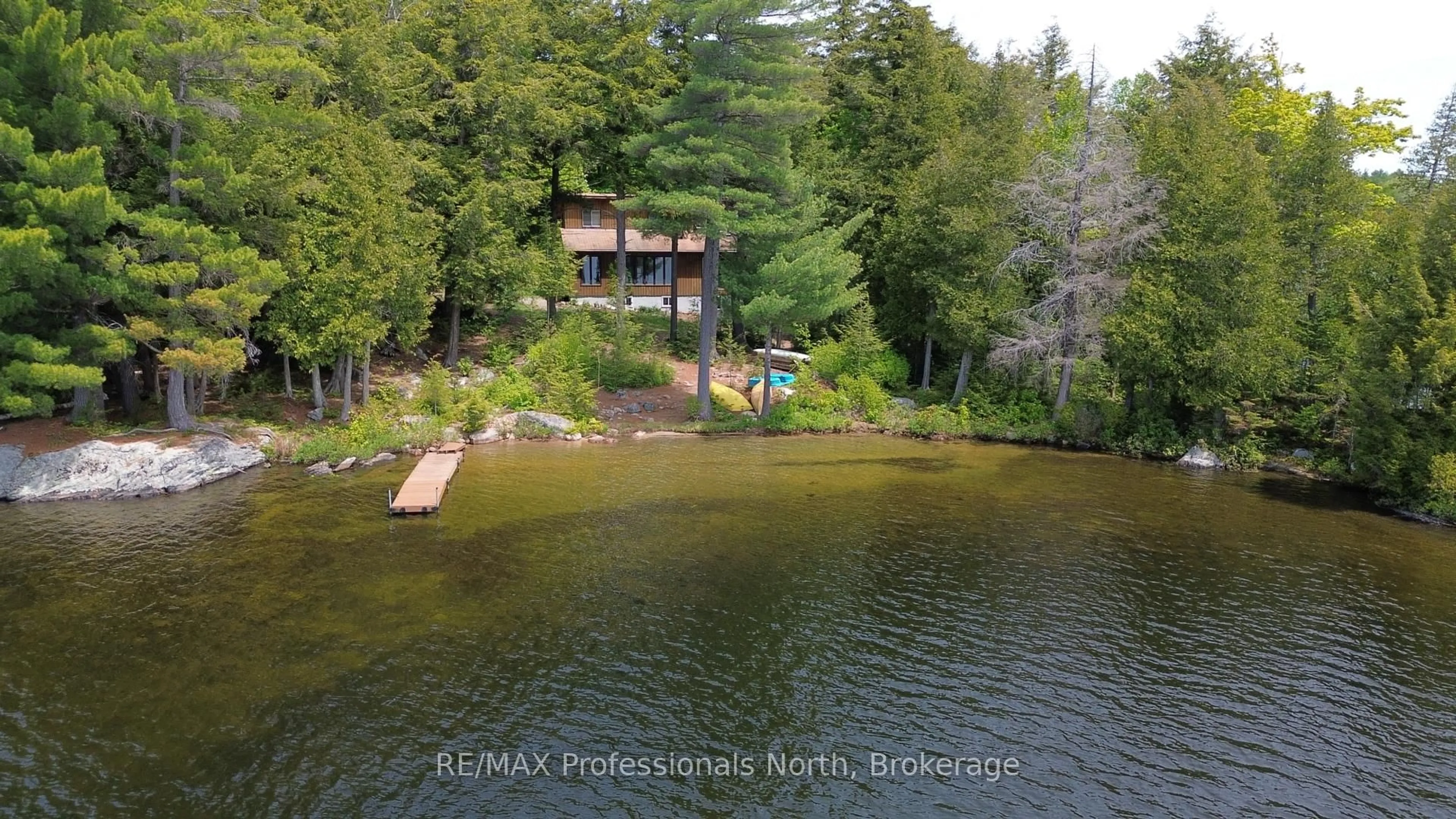 A pic from outside/outdoor area/front of a property/back of a property/a pic from drone, water/lake/river/ocean view for 1294 Trinity Rd, Highlands East Ontario K0L 2A0