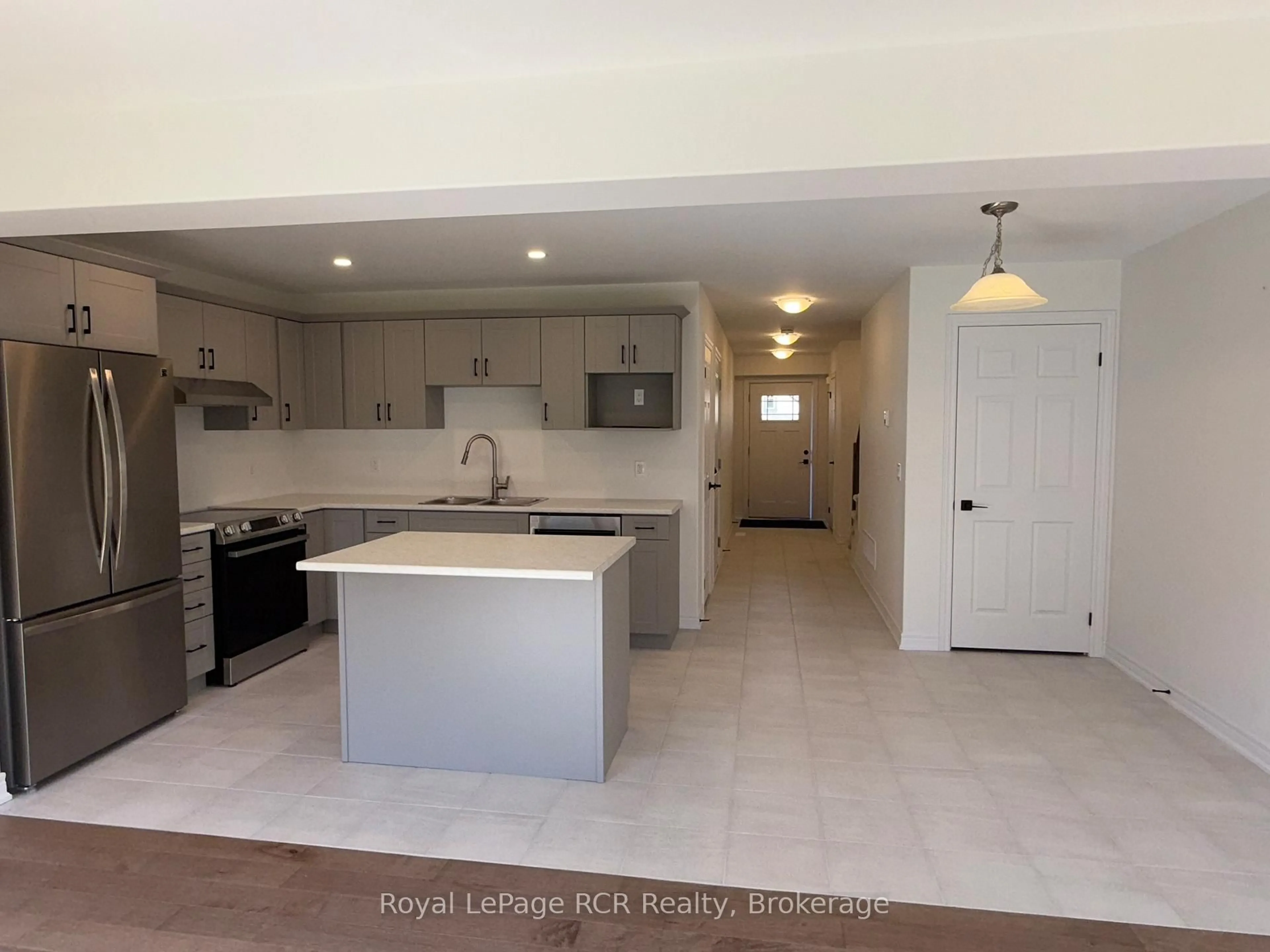 Open concept kitchen, ceramic/tile floor for 133 McCausland Dr, Grey Highlands Ontario N0C 1H0