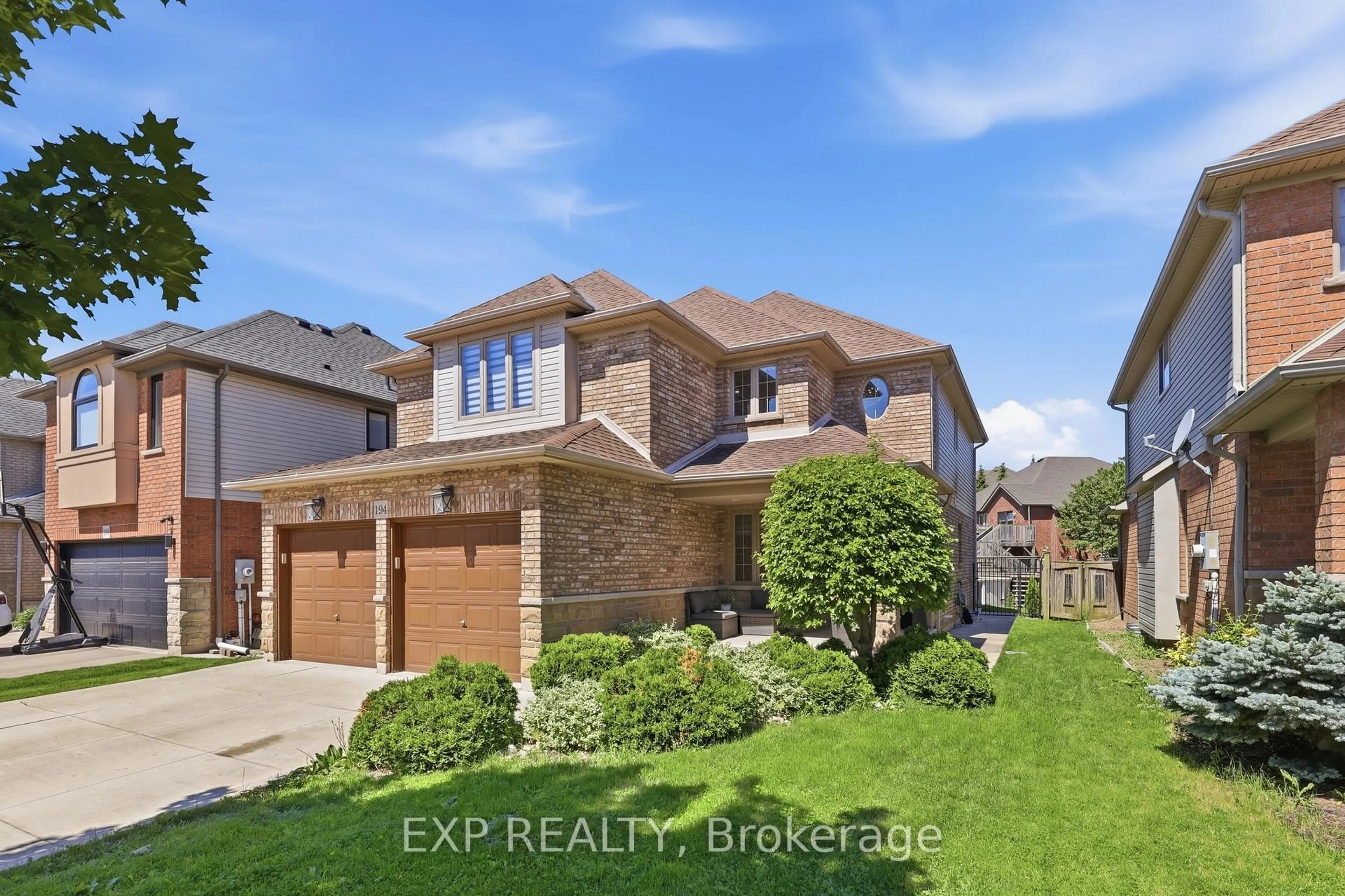Home with brick exterior material, street for 194 Southbrook Dr, Hamilton Ontario L0R 1C0