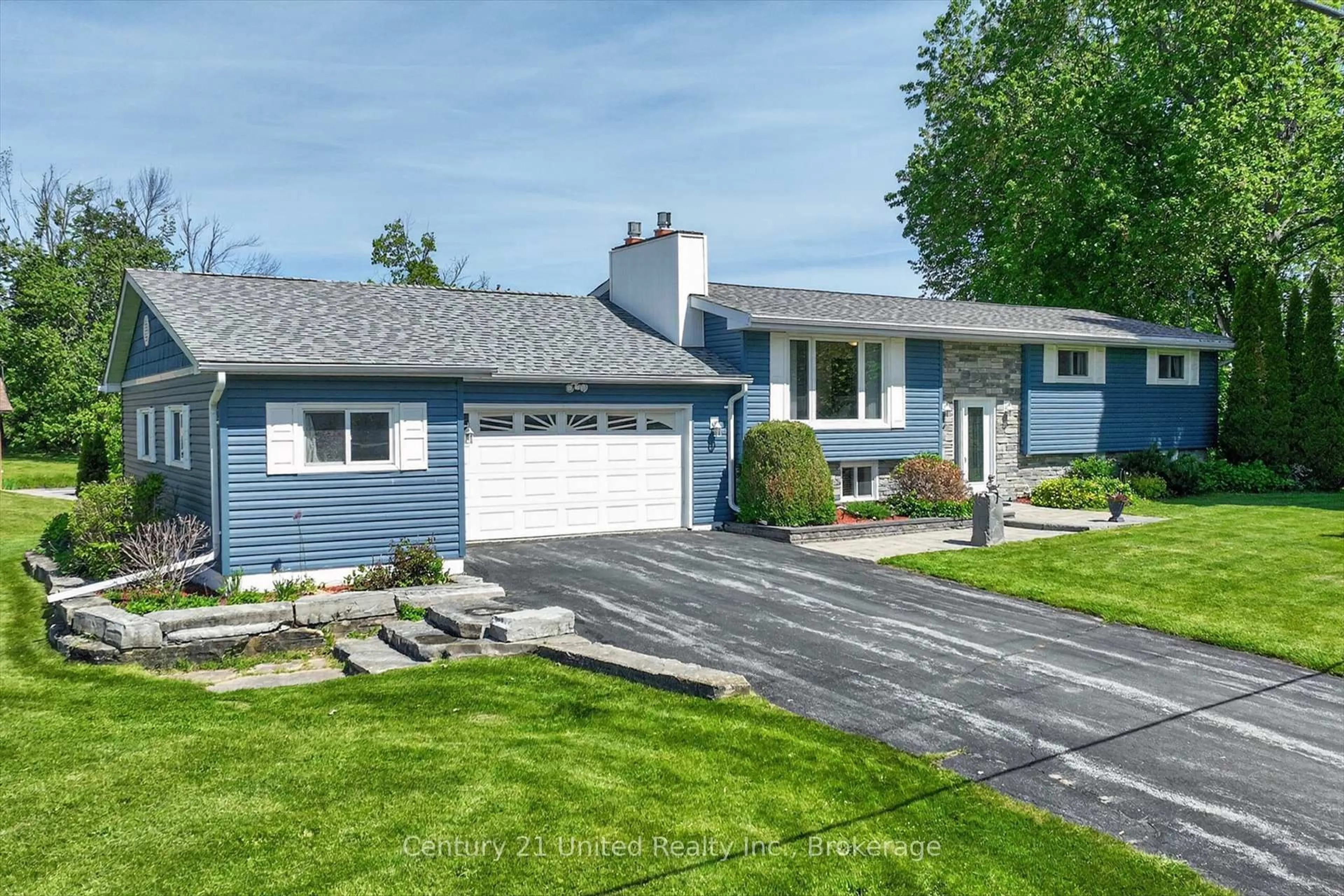 Home with vinyl exterior material, street for 1190 Nuforest Dr, Selwyn Ontario K0L 1T0