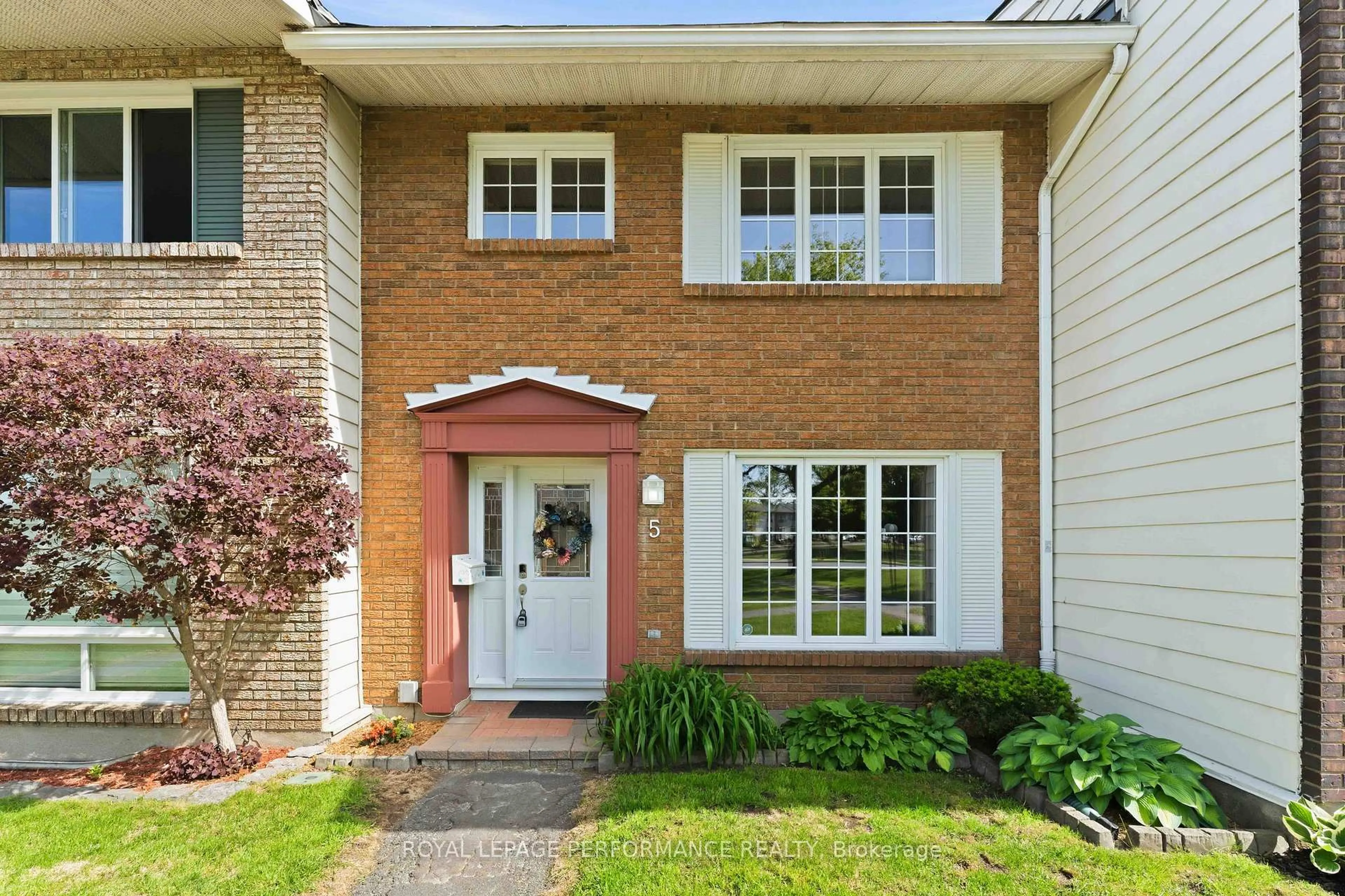 Home with brick exterior material, street for 2051 Jasmine Cres #5, Ottawa Ontario K1J 7W2