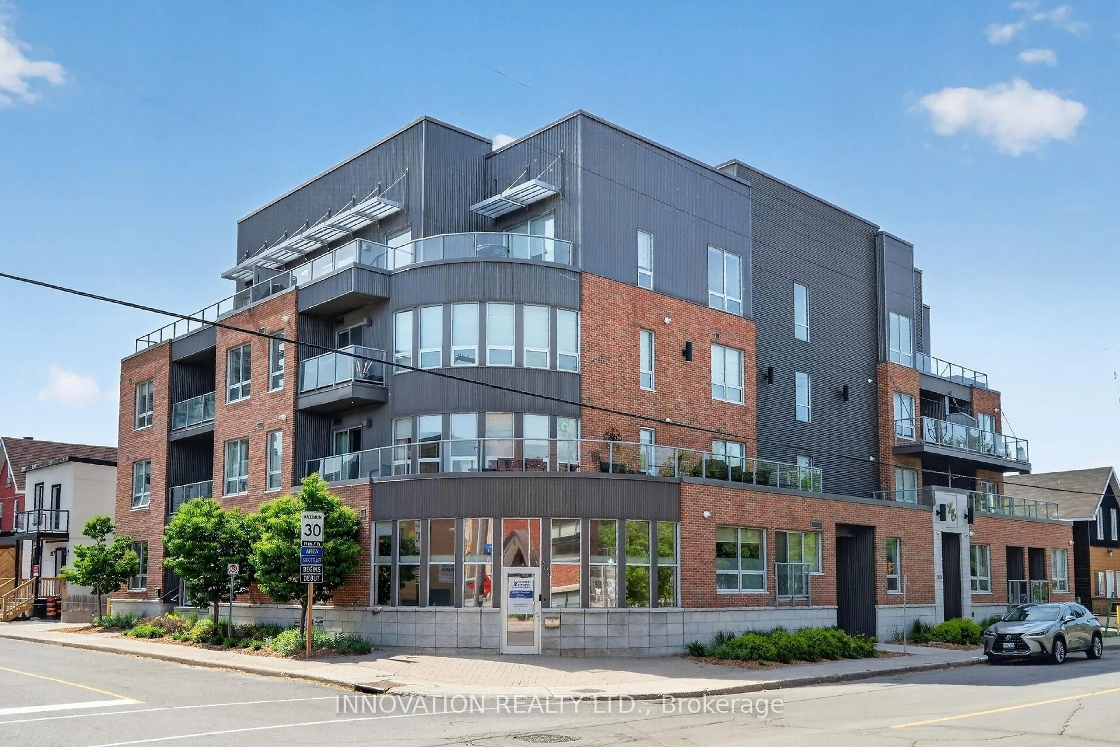 Home with brick exterior material, building for 390 Booth St #307, Ottawa Ontario K1R 7K6