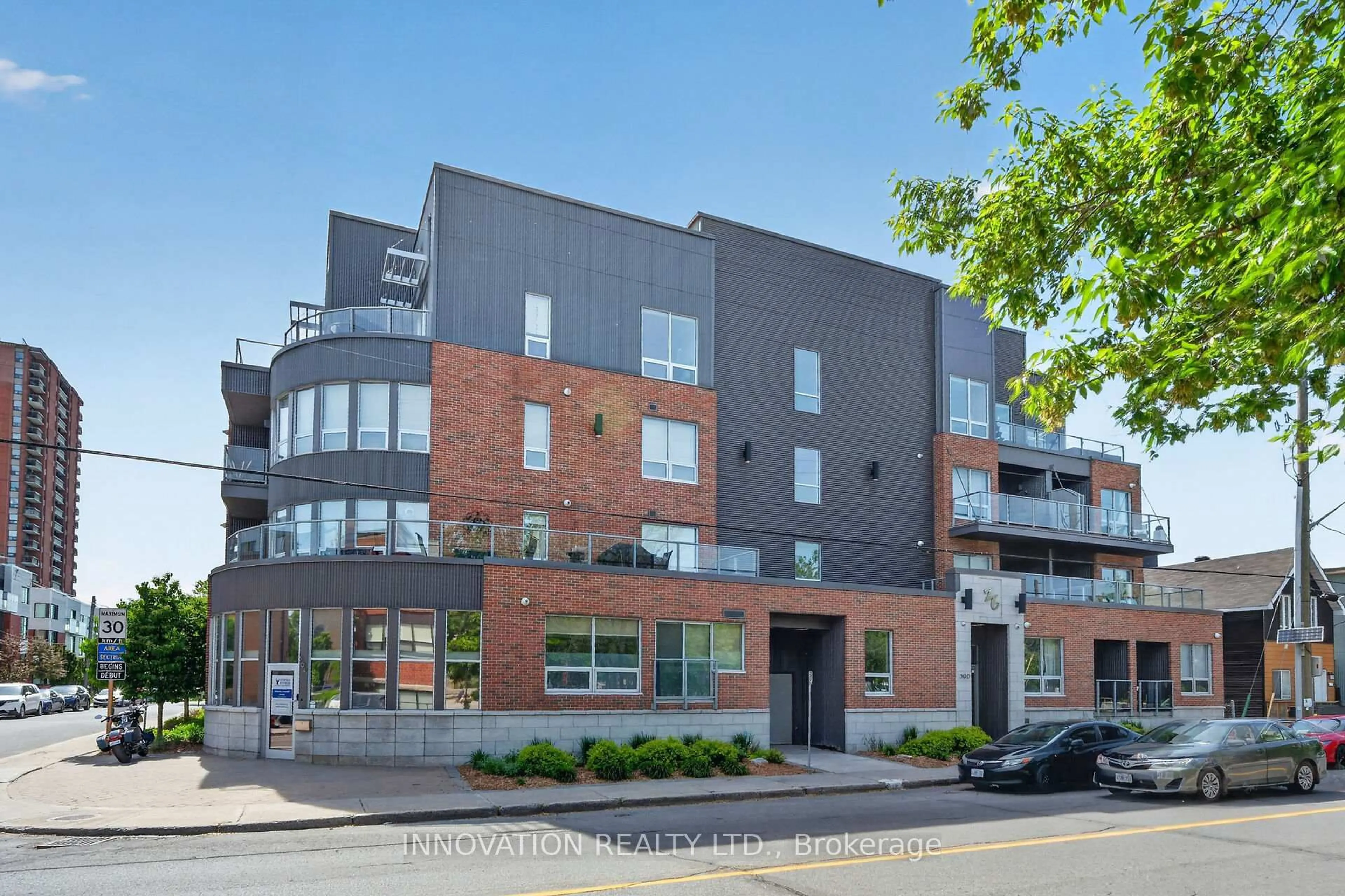 Home with brick exterior material, street for 390 Booth St #307, Ottawa Ontario K1R 7K6