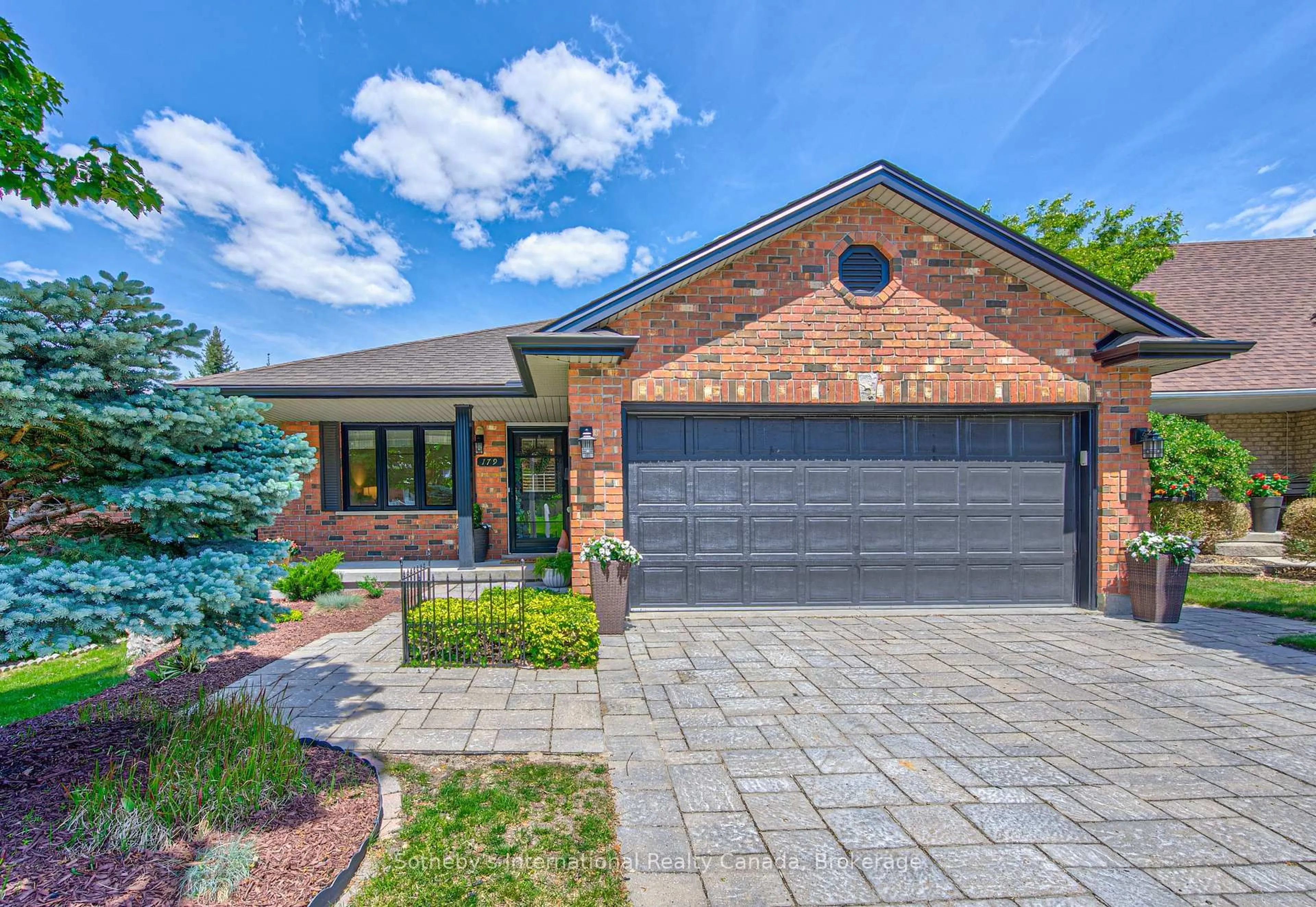 Home with brick exterior material, street for 179 Westchester Dr, Kitchener Ontario N2B 3M8