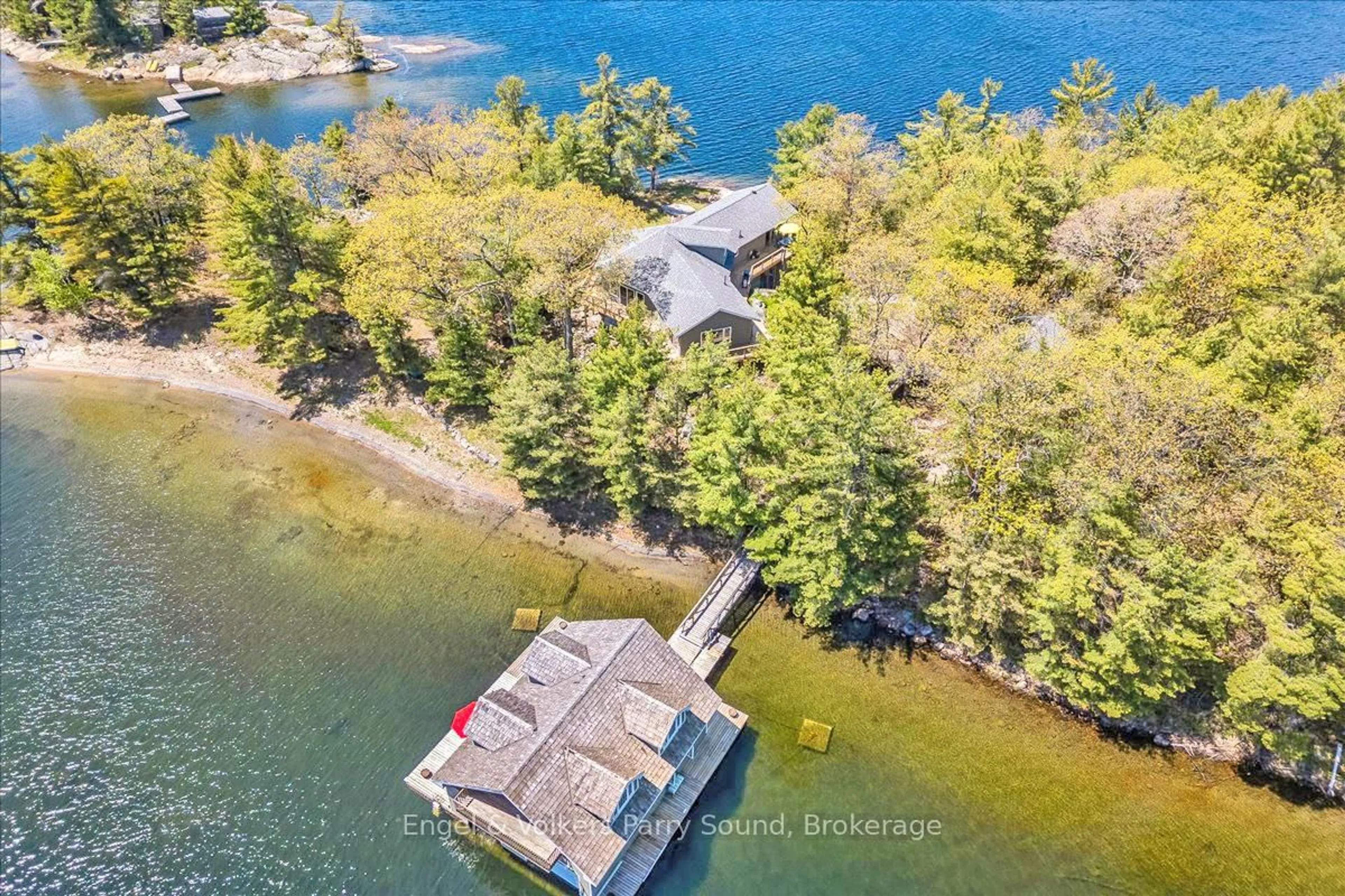 A pic from outside/outdoor area/front of a property/back of a property/a pic from drone, water/lake/river/ocean view for 1 B649 (Markham) Island, The Archipelago Ontario P0G 1G0