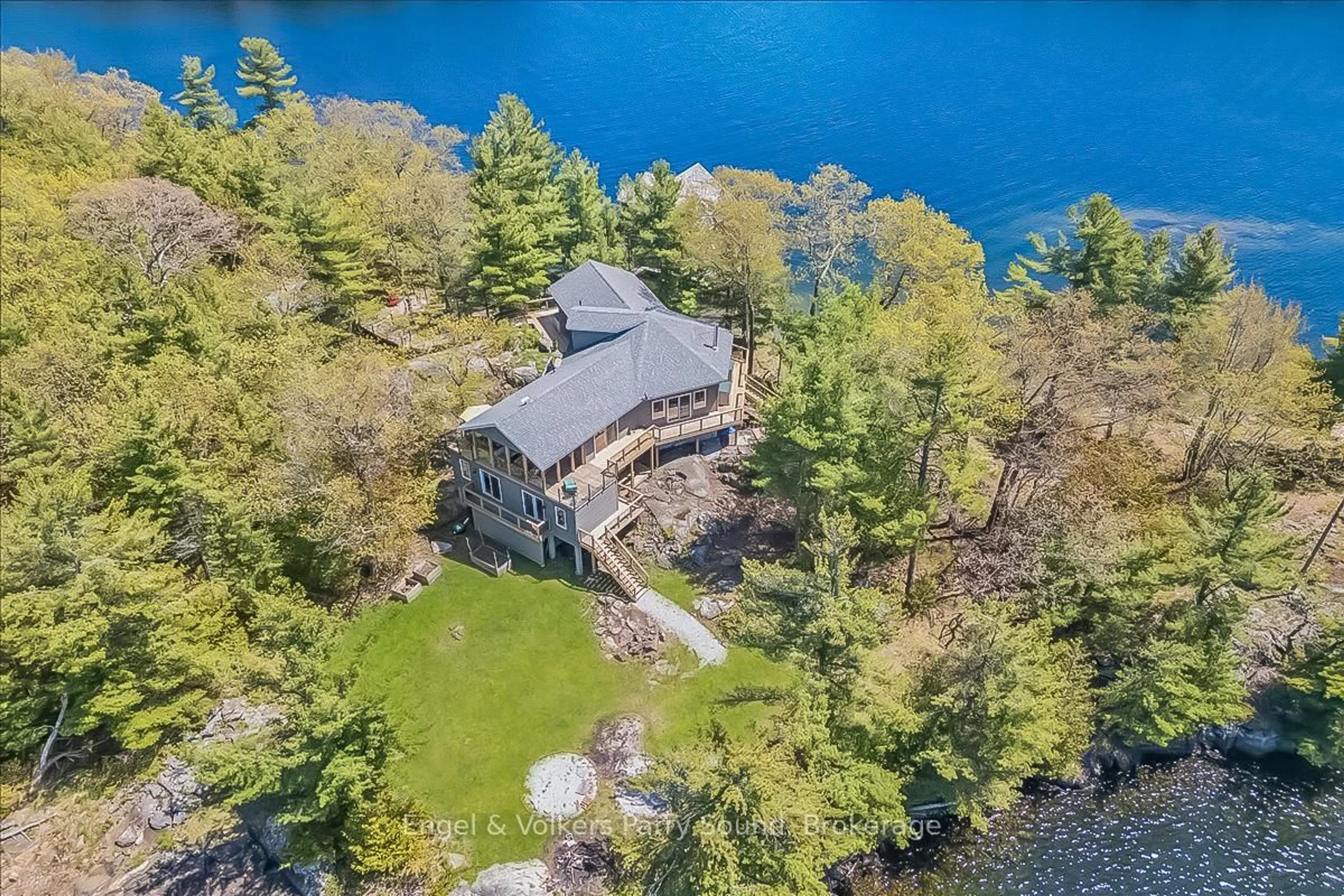 A pic from outside/outdoor area/front of a property/back of a property/a pic from drone, water/lake/river/ocean view for 1 B649 (Markham) Island, The Archipelago Ontario P0G 1G0