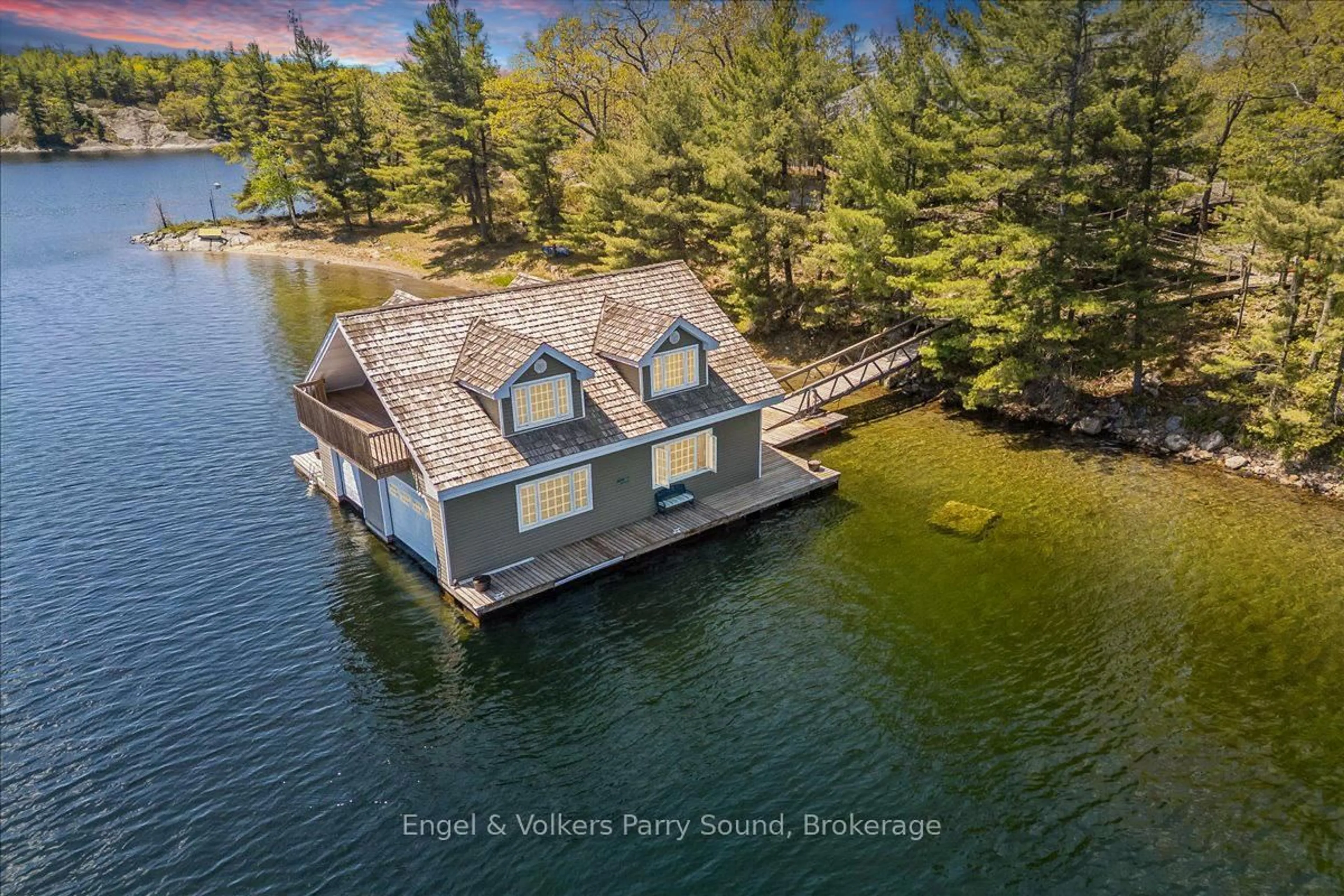 A pic from outside/outdoor area/front of a property/back of a property/a pic from drone, water/lake/river/ocean view for 1 B649 (Markham) Island, The Archipelago Ontario P0G 1G0