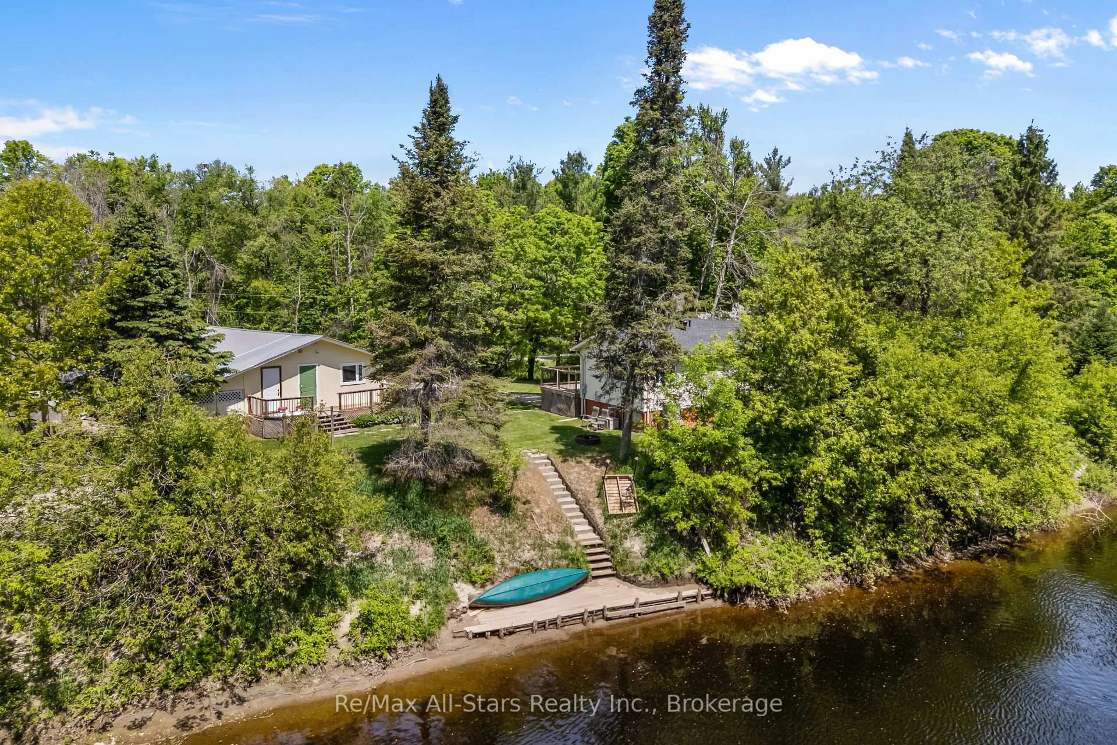 A pic from outside/outdoor area/front of a property/back of a property/a pic from drone, water/lake/river/ocean view for 60 Reed Blvd, Kawartha Lakes Ontario K0M 1C0