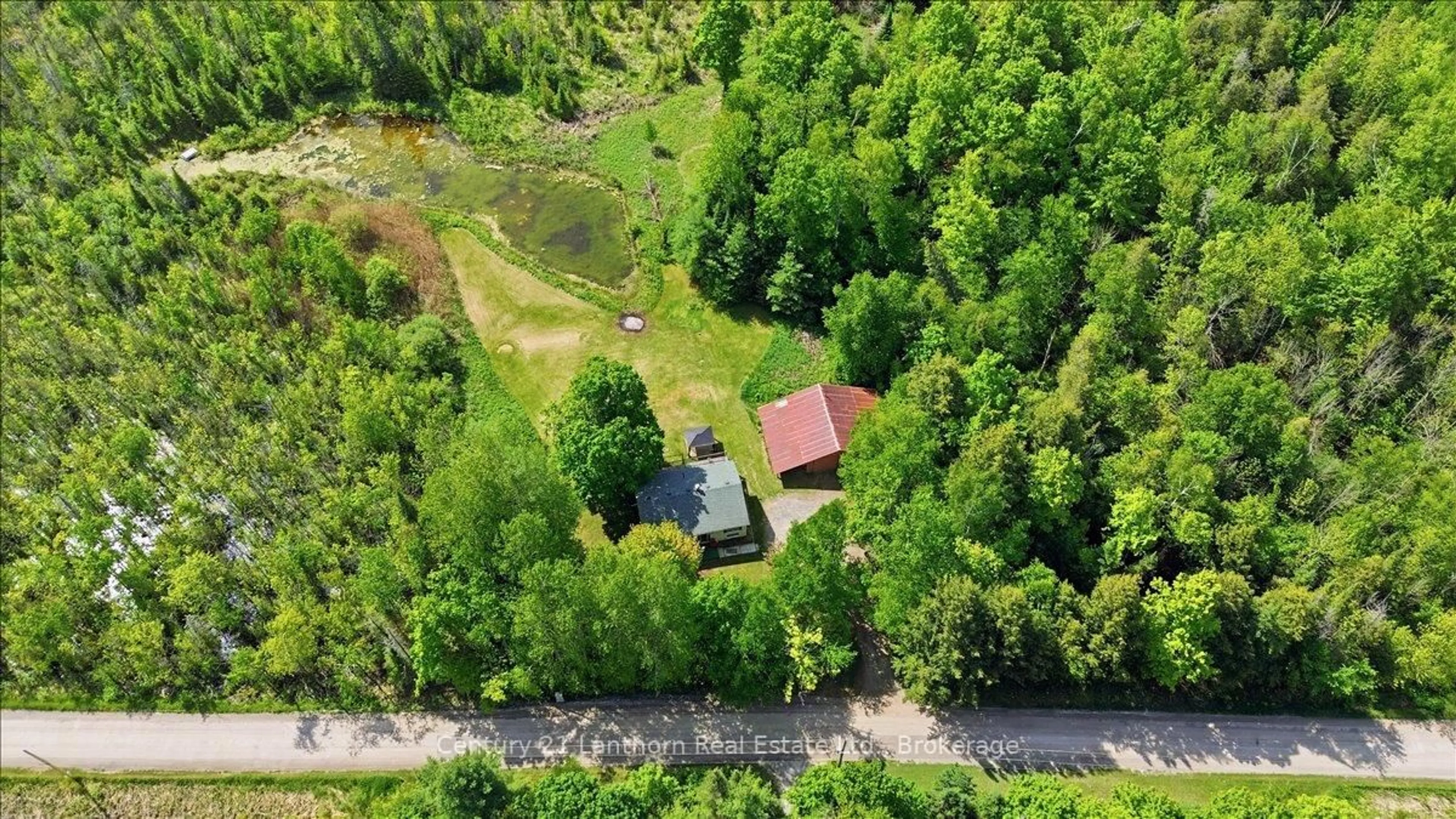 A pic from outside/outdoor area/front of a property/back of a property/a pic from drone, forest/trees view for 854 Beaver Creek Rd, Limoges Ontario K0K 2M0