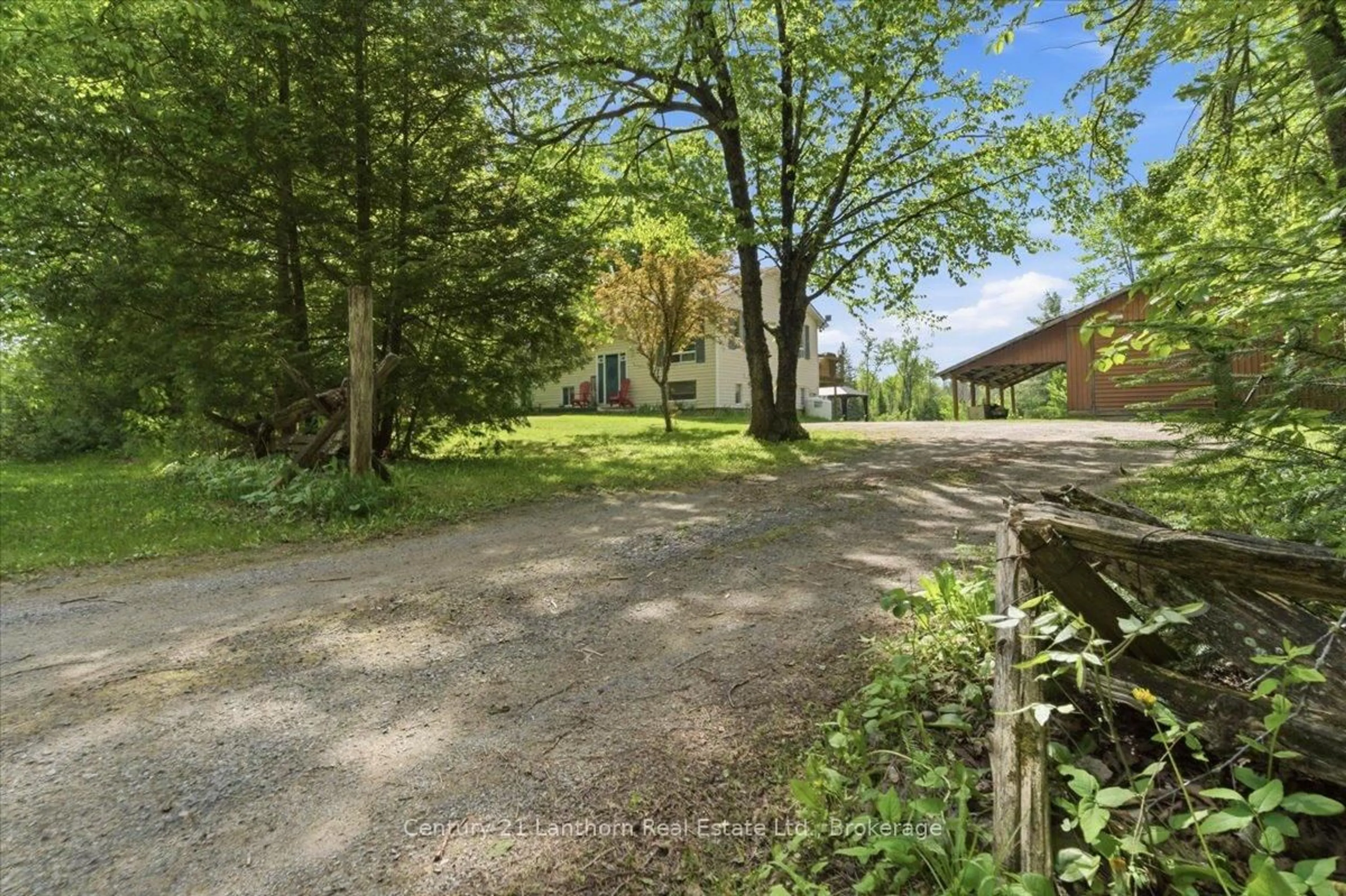 A pic from outside/outdoor area/front of a property/back of a property/a pic from drone, forest/trees view for 854 Beaver Creek Rd, Limoges Ontario K0K 2M0
