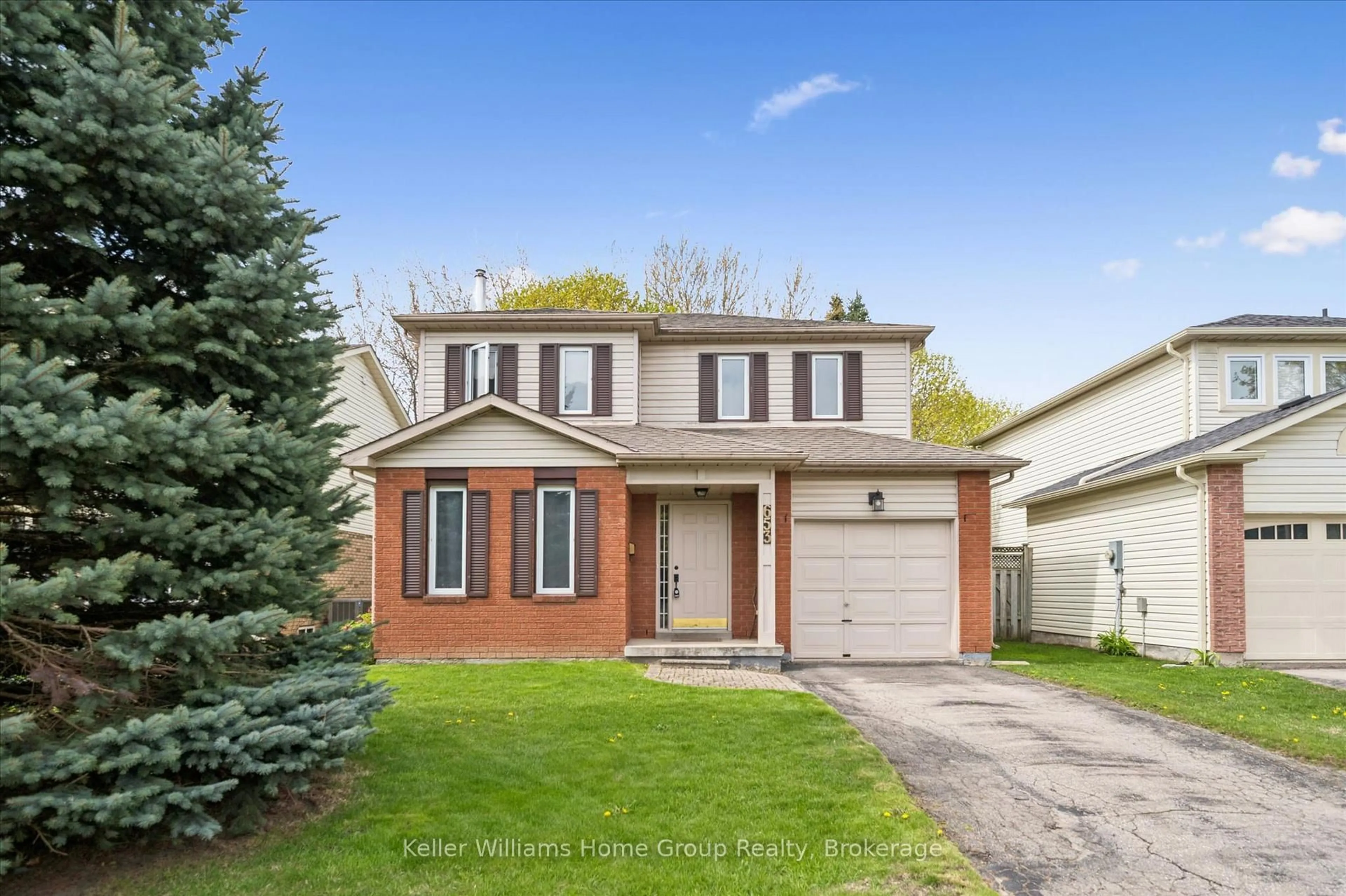 Home with brick exterior material, street for 653 Holman Cres, Centre Wellington Ontario N1M 3M2
