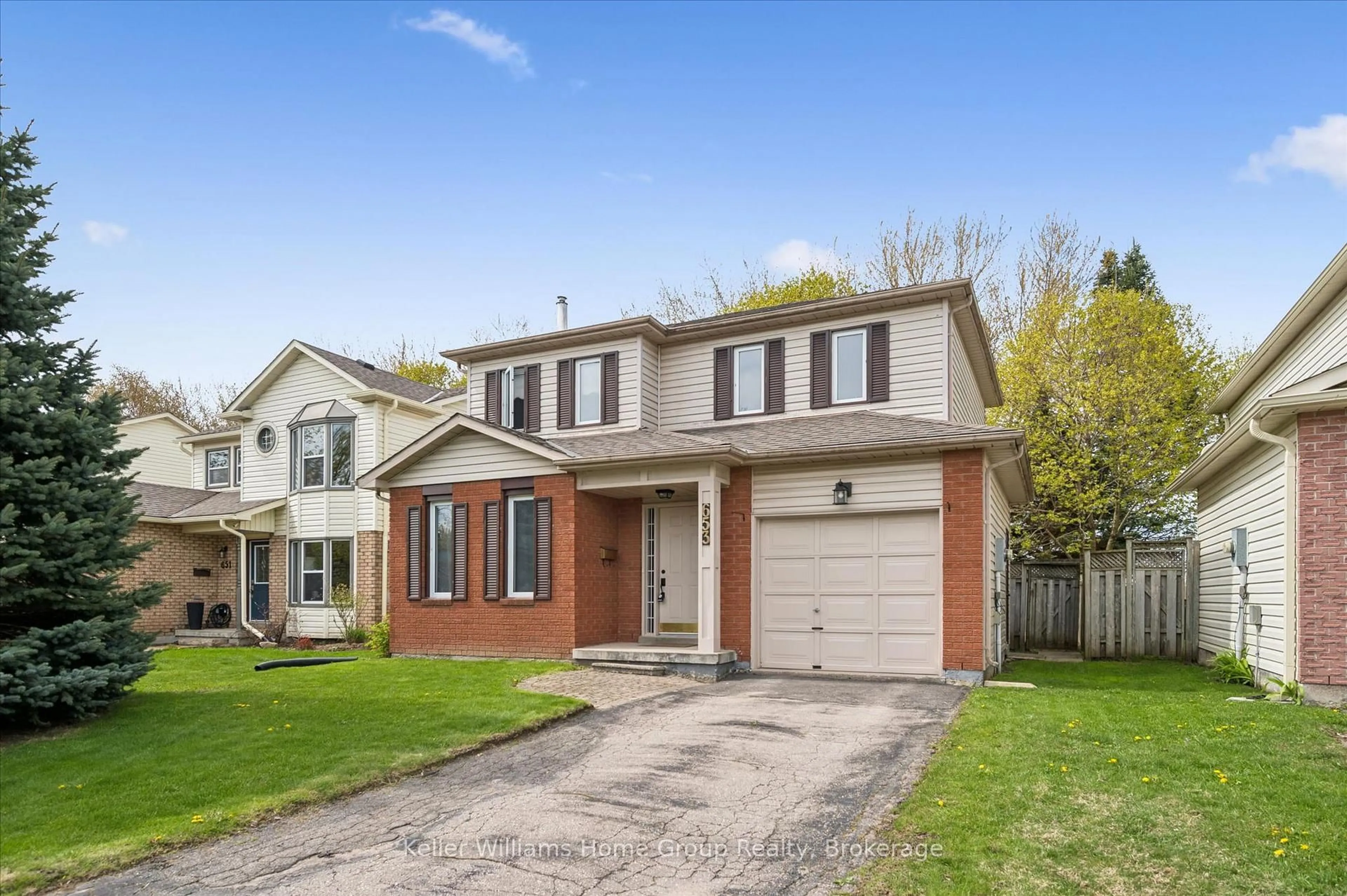 Home with brick exterior material, street for 653 Holman Cres, Centre Wellington Ontario N1M 3M2