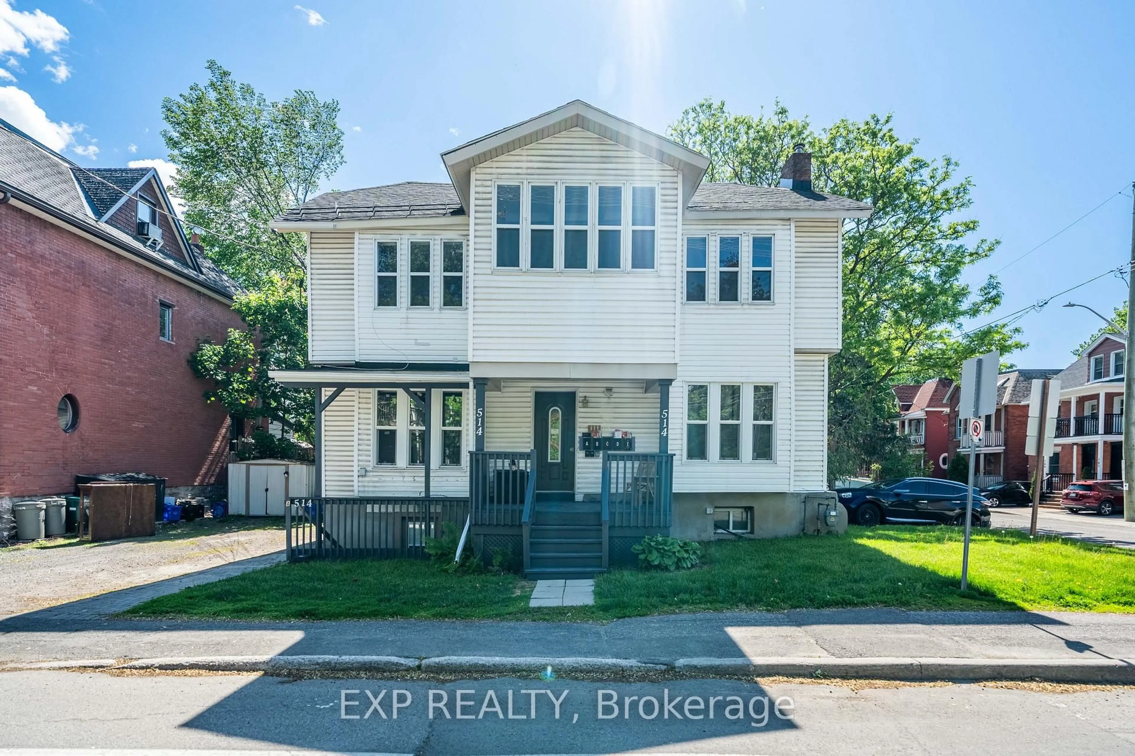 Home with brick exterior material, street for 514 Lyon St, Ottawa Ontario K1R 5X9