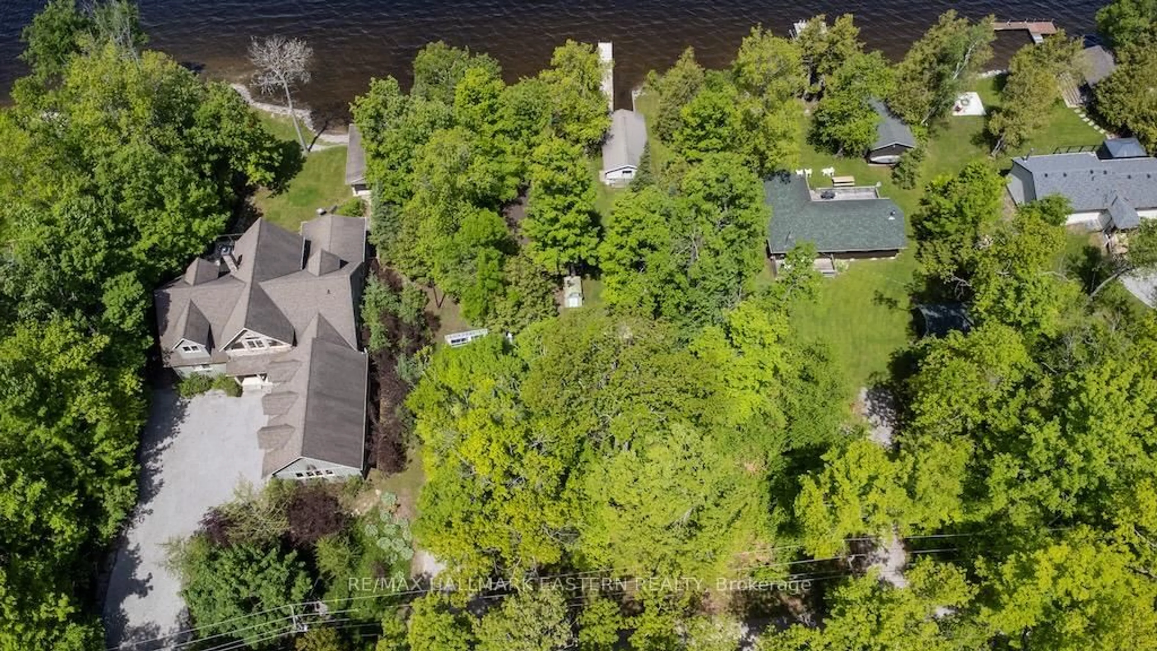 A pic from outside/outdoor area/front of a property/back of a property/a pic from drone, water/lake/river/ocean view for 149 Fire Route 72, Trent Lakes Ontario K0L 1J0