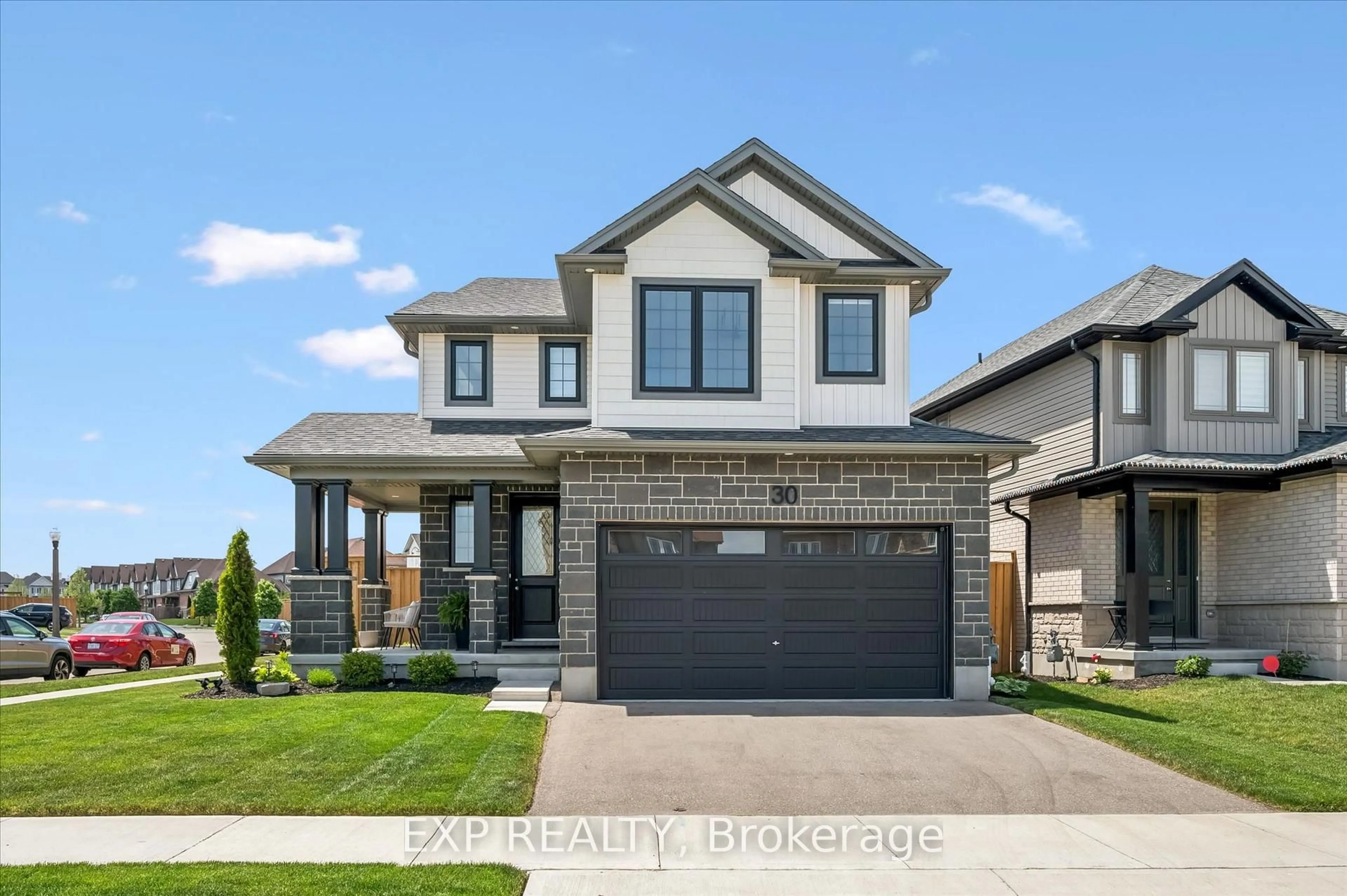 Home with brick exterior material, street for 30 Waterbow Tr, Kitchener Ontario N2A 0K4