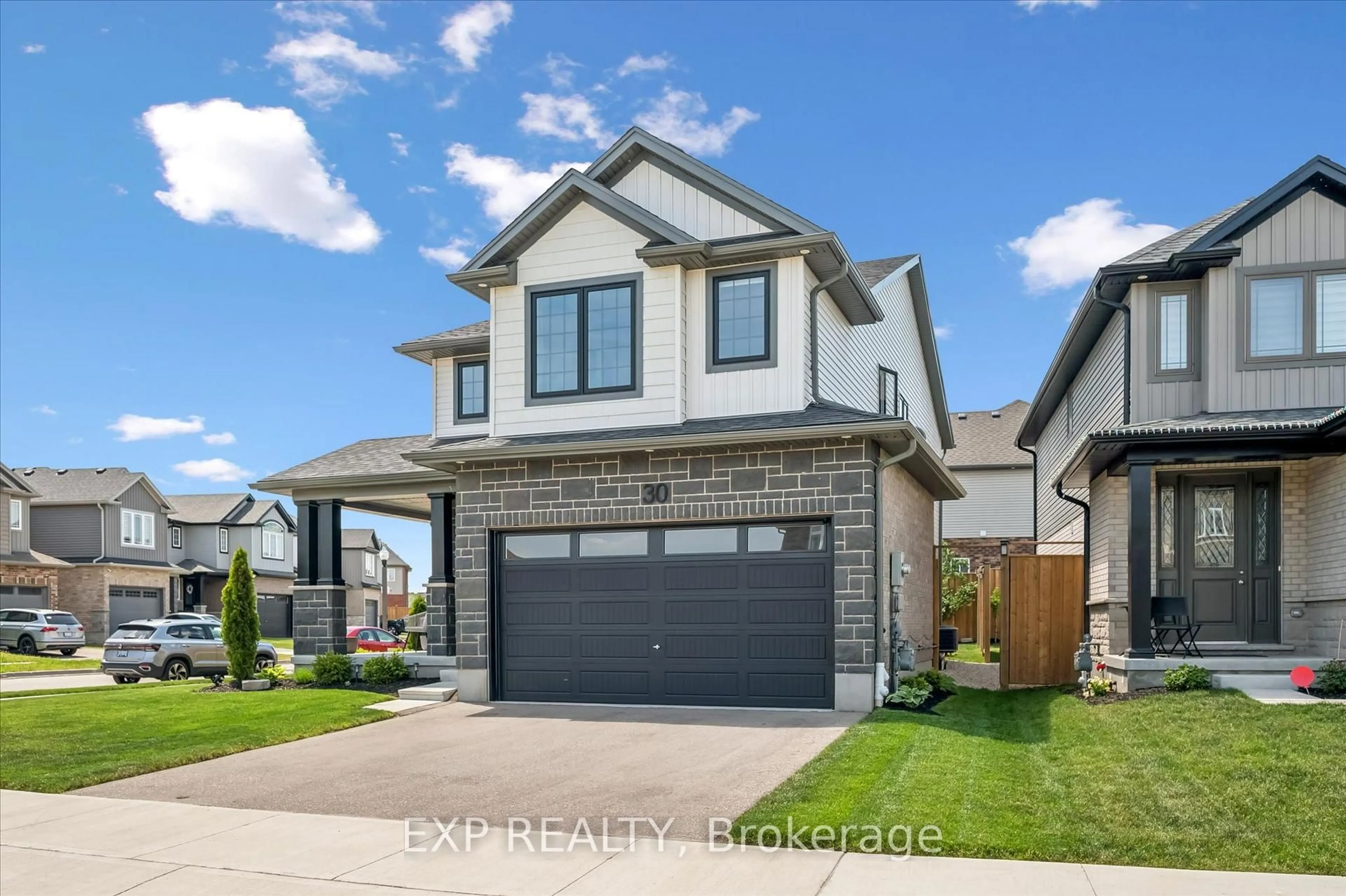 Home with brick exterior material, street for 30 Waterbow Tr, Kitchener Ontario N2A 0K4