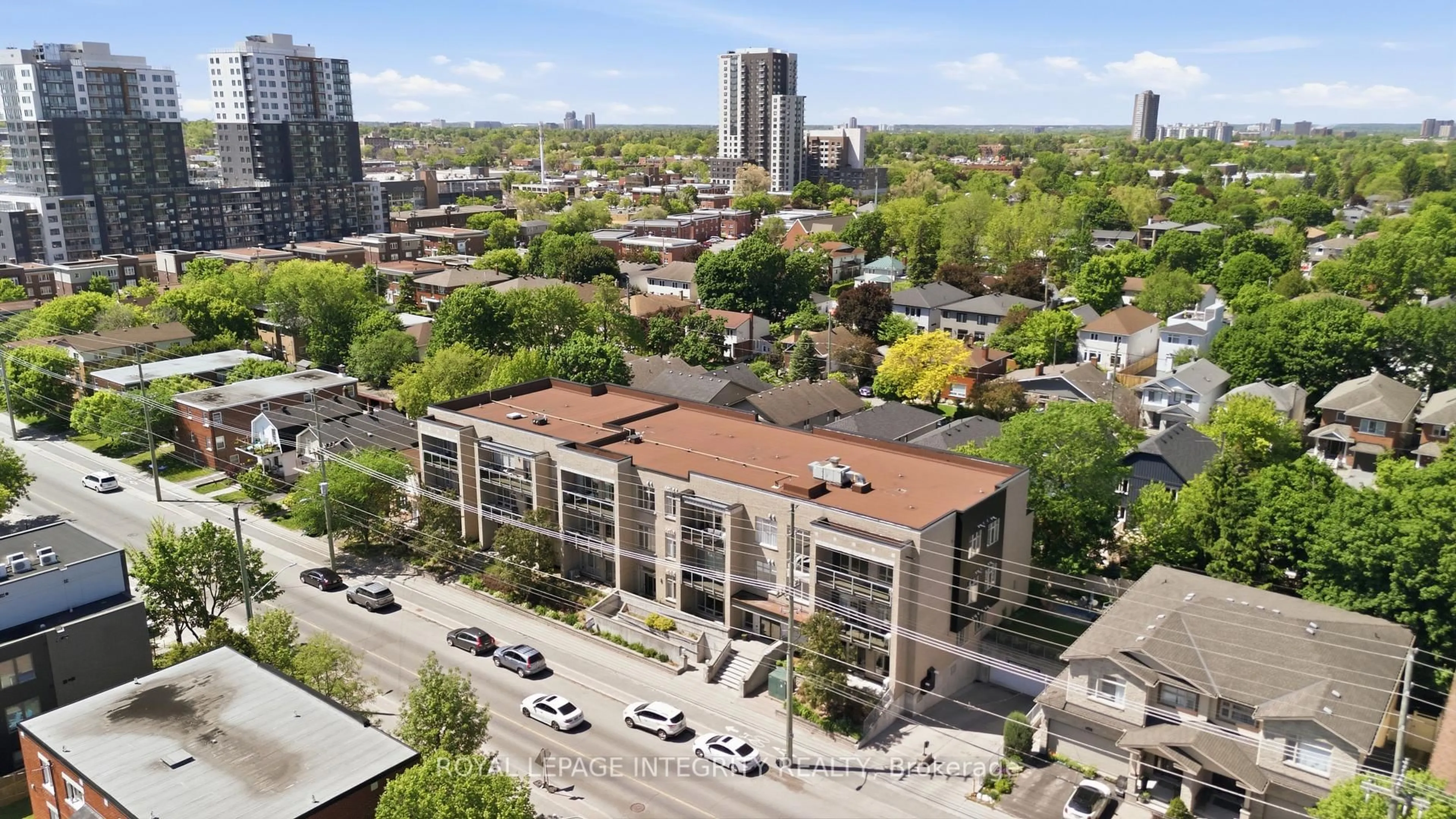 A pic from outside/outdoor area/front of a property/back of a property/a pic from drone, city buildings view from balcony for 682 Churchill Ave #310, Ottawa Ontario K1Z 5G5