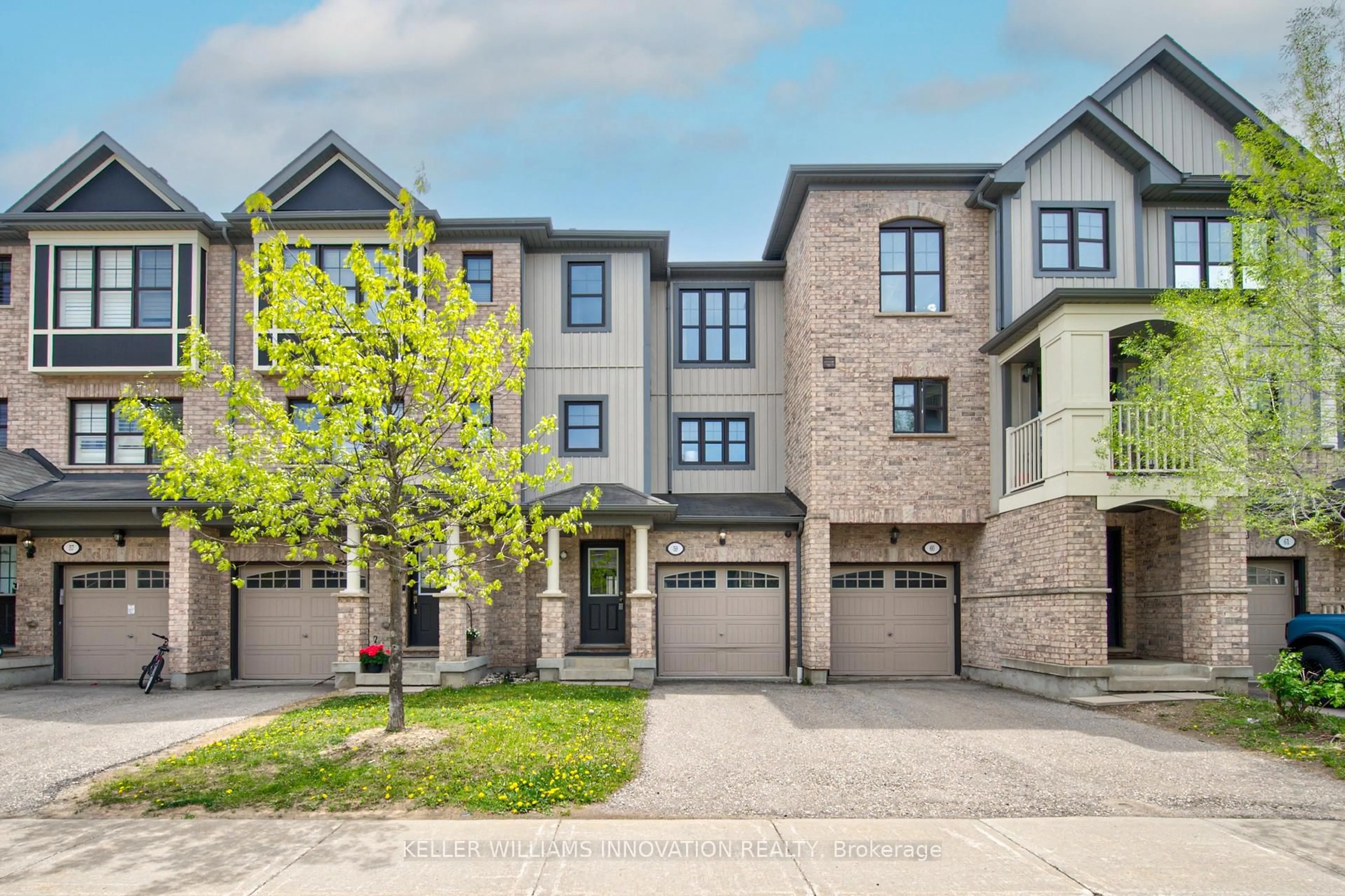 Home with brick exterior material, street for 701 Homer Watson Blvd #59, Kitchener Ontario N2C 0B5