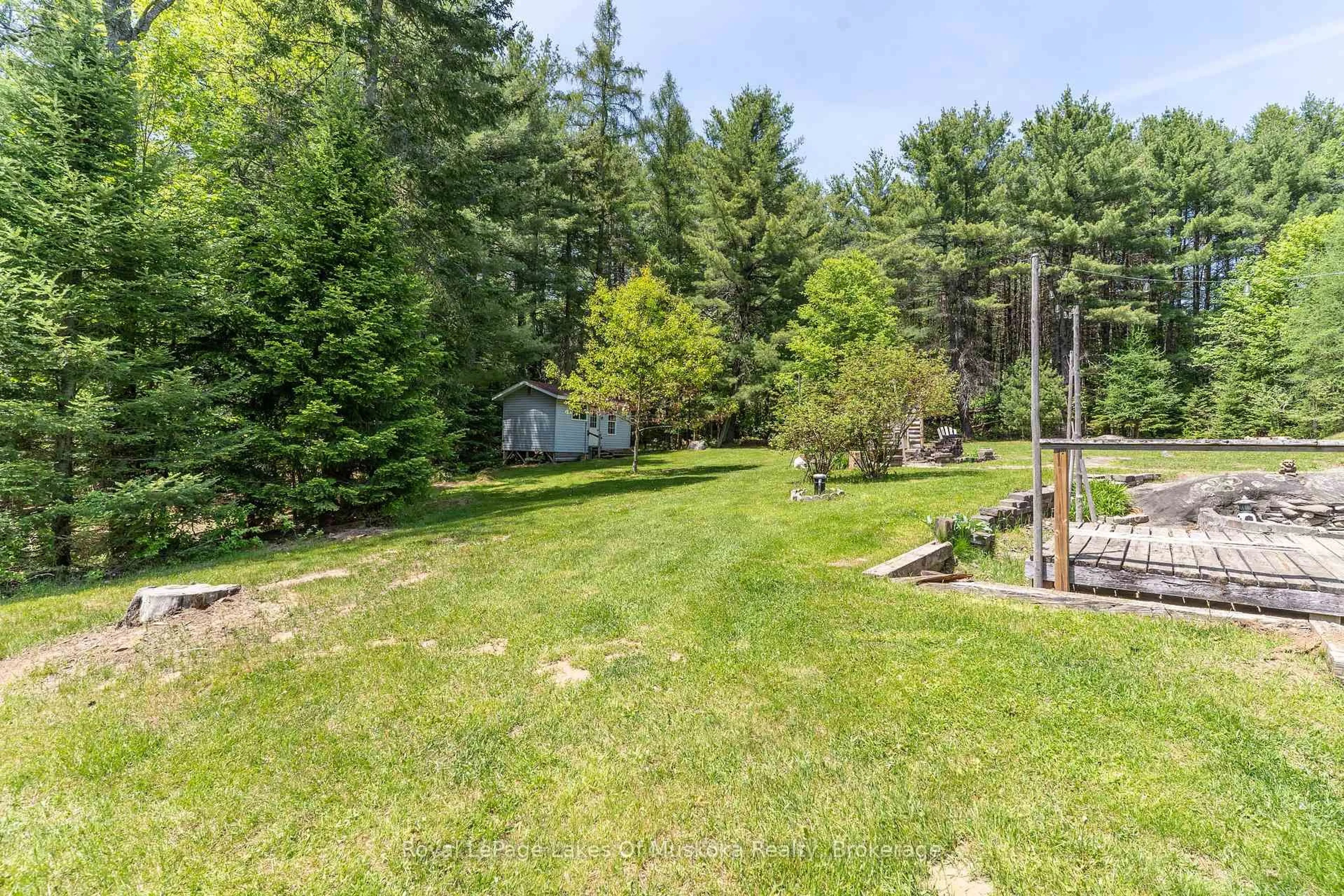 Patio, forest/trees view for 244 South Mary Lake Rd, Huntsville Ontario P0B 1L0